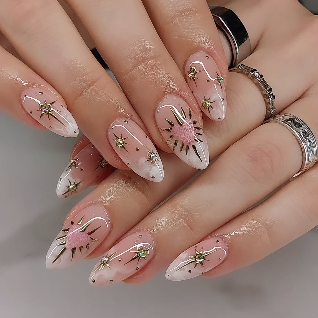 Celestial Sunburst Almond Nails with Gems