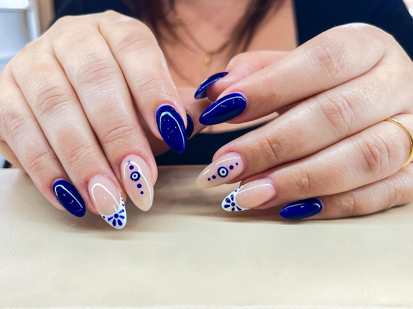 Evil Eye French Tip Almond Nails