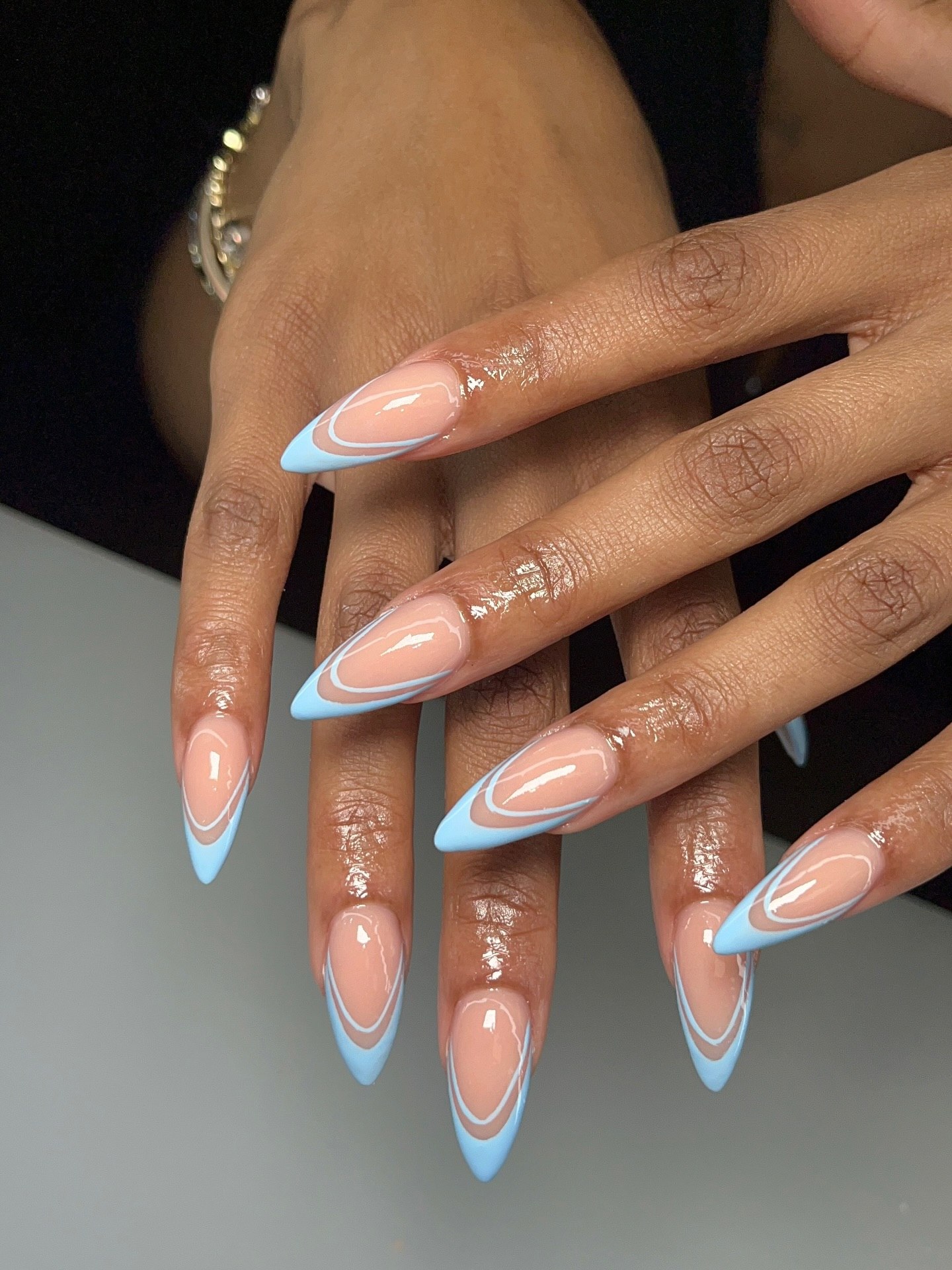 Sky Blue French Tip Almond Nails