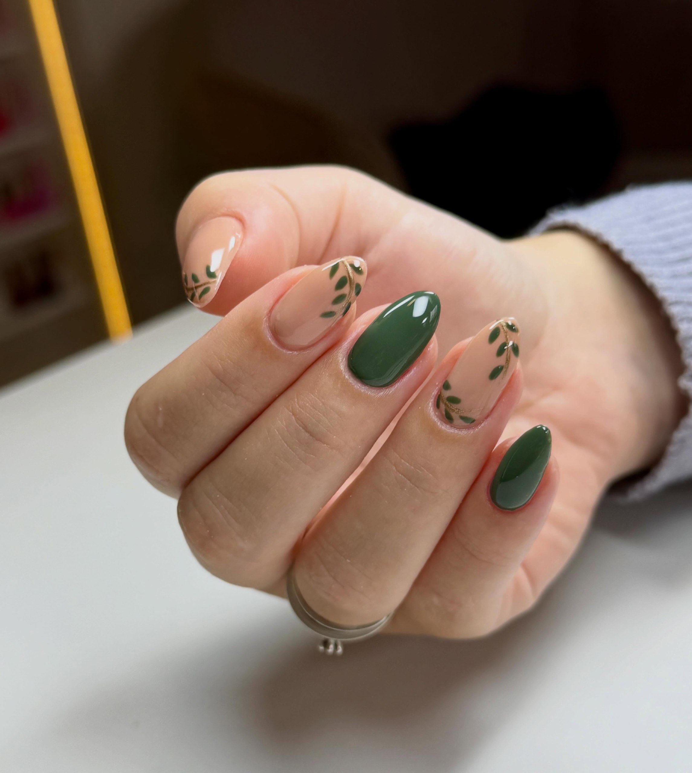 Deep Forest Green Almond Nails with Botanical Accents