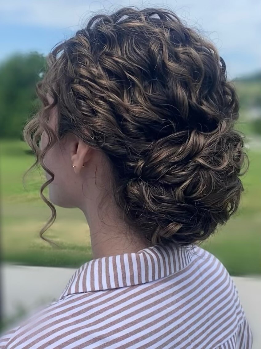Romantic Braided Updo With Loose Curls