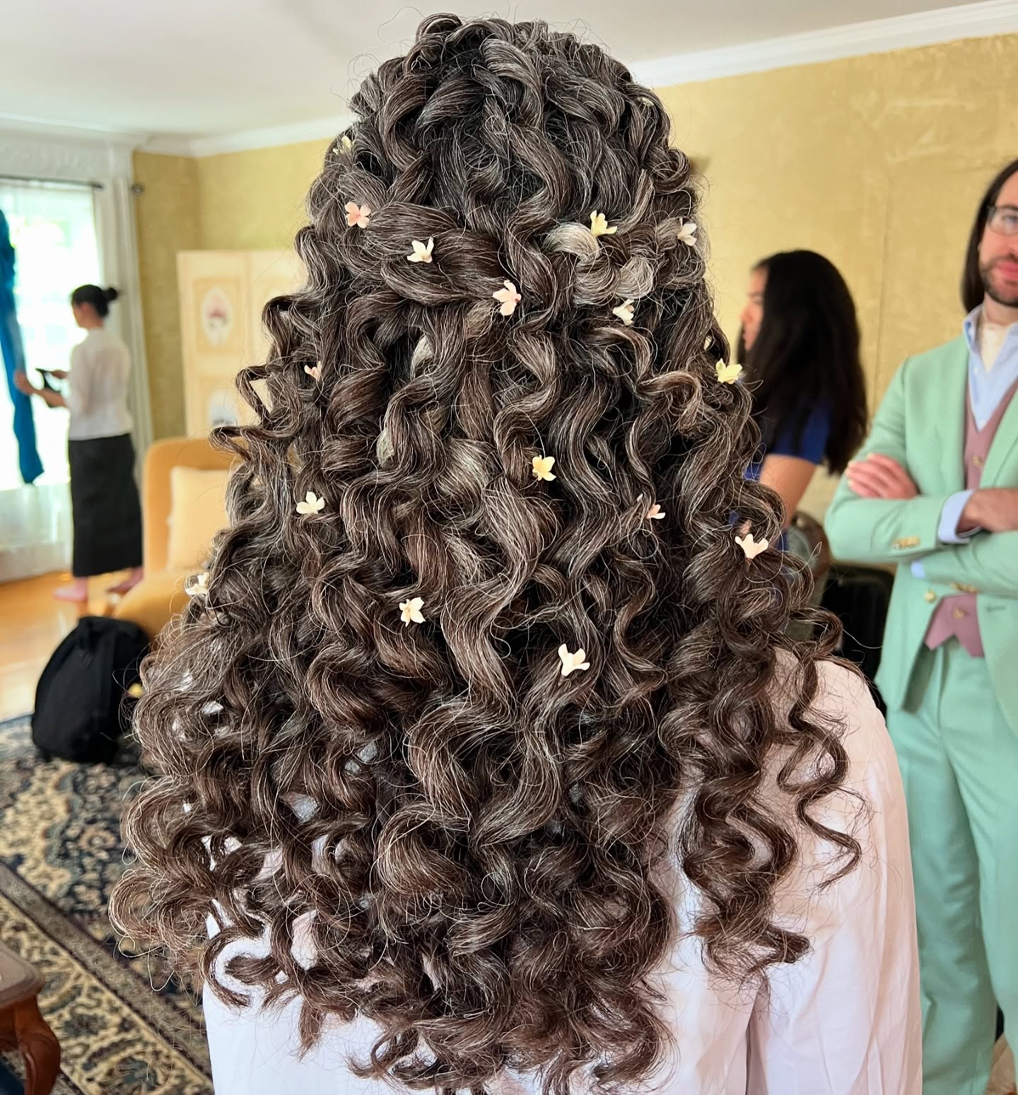 Whimsical Curls With Delicate Floral Accents