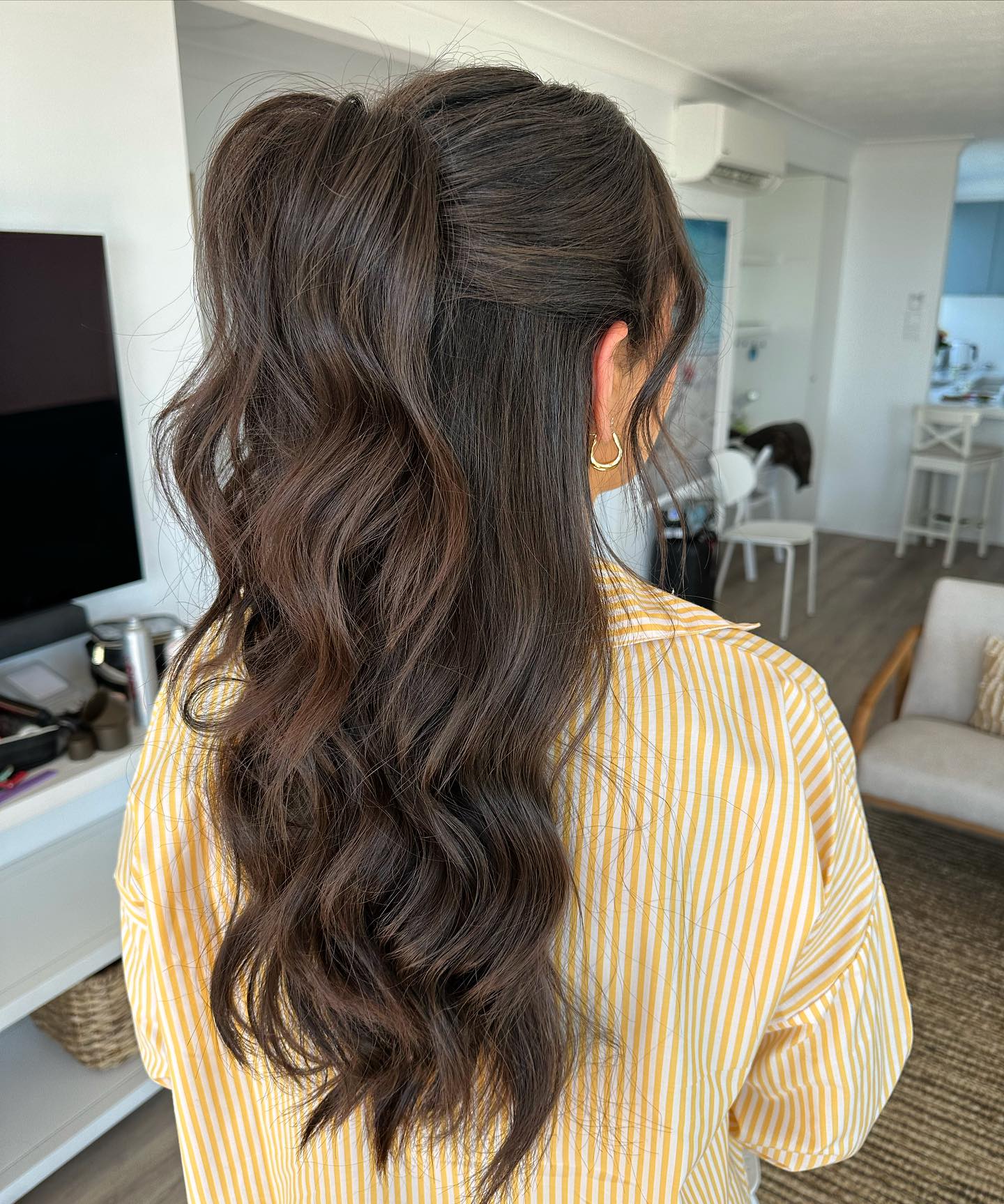 Voluminous Half-Up High Ponytail With Loose Waves