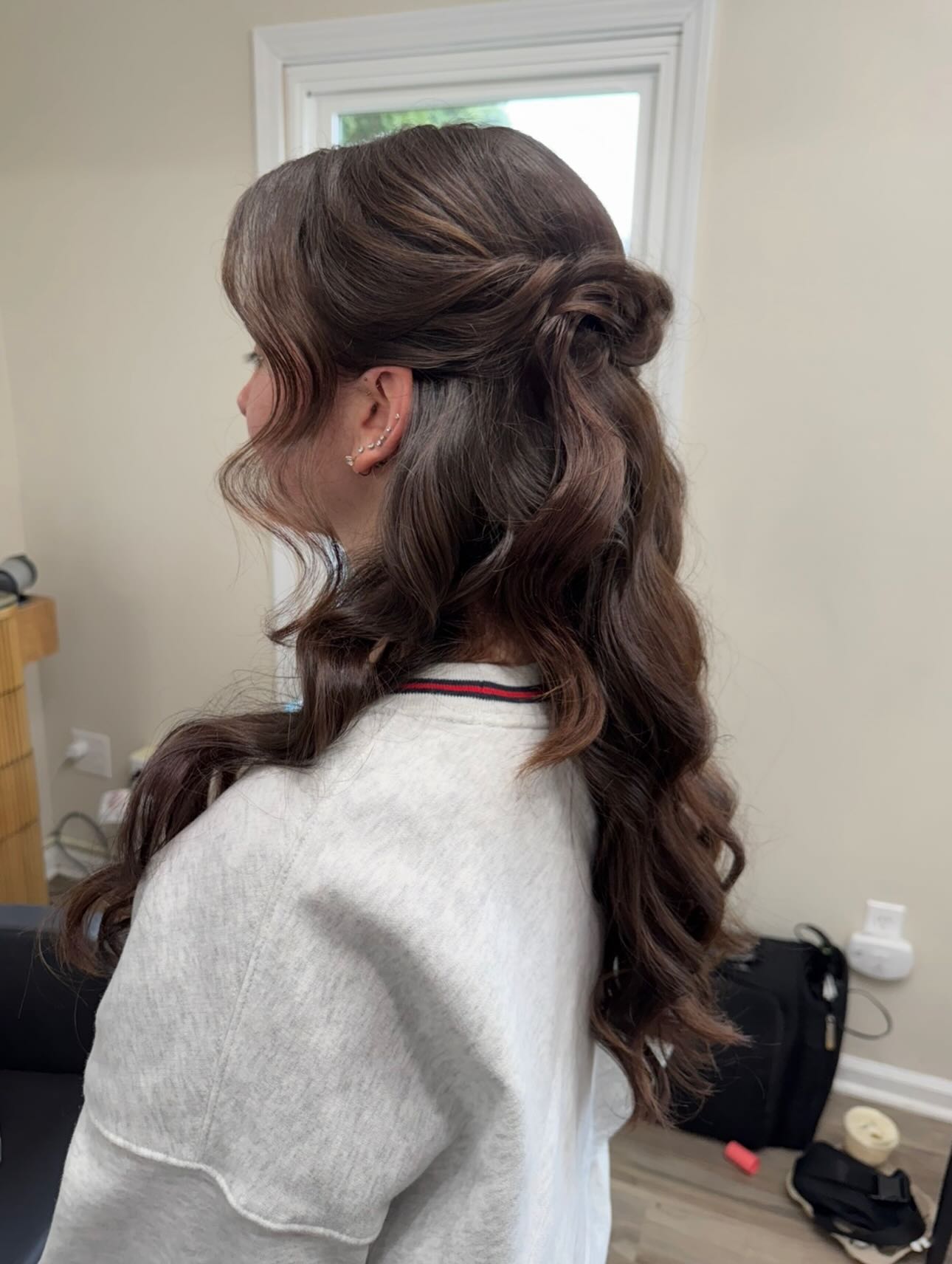 Twisted Half-Up Bun With Loose Waves