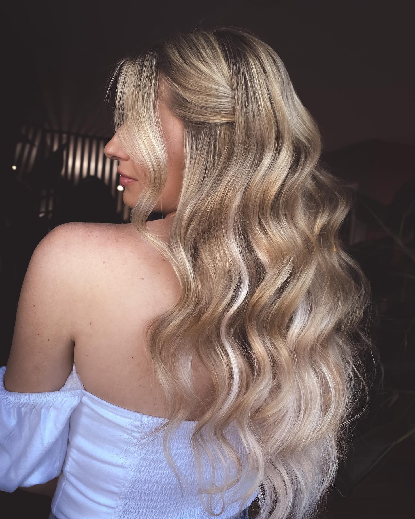 Soft Blonde Waves With Face Framing Layers