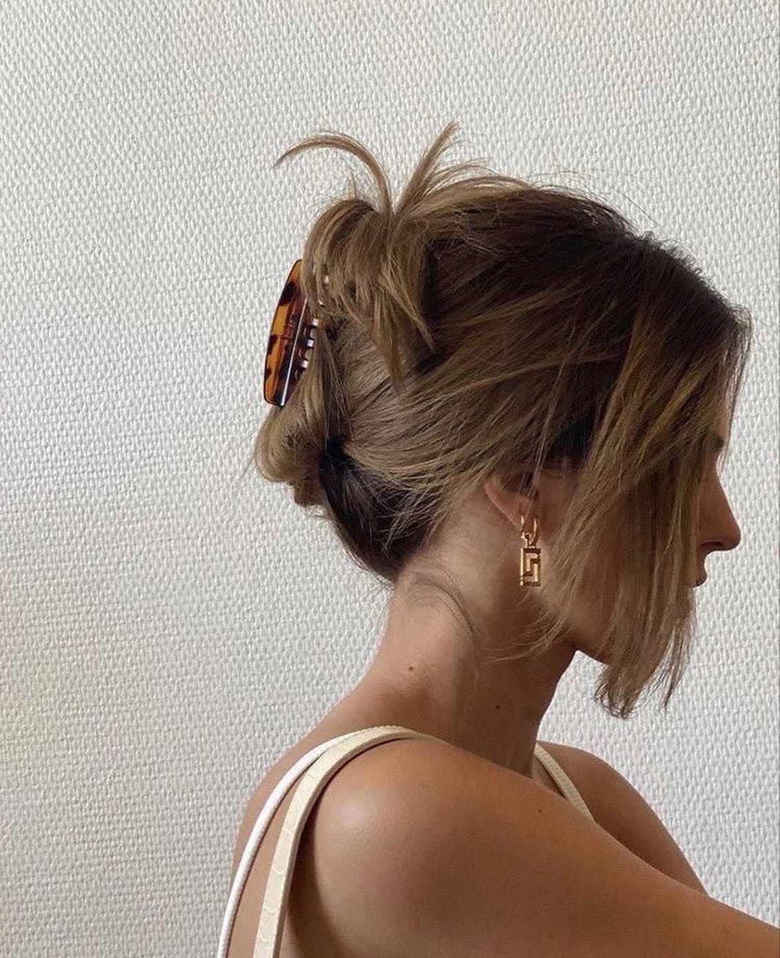 Effortless Claw Clip Updo With Face-Framing Strands