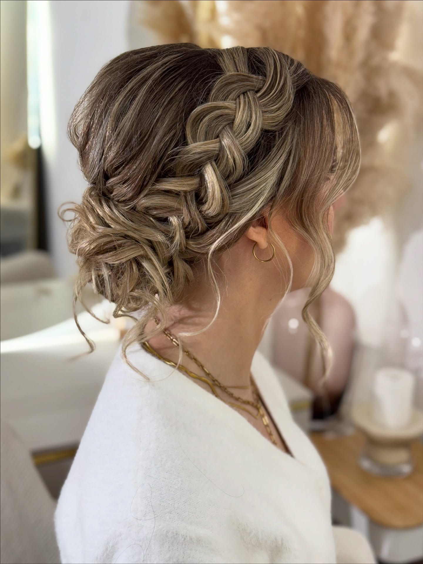 Braided Updo With Wispy Tendrils