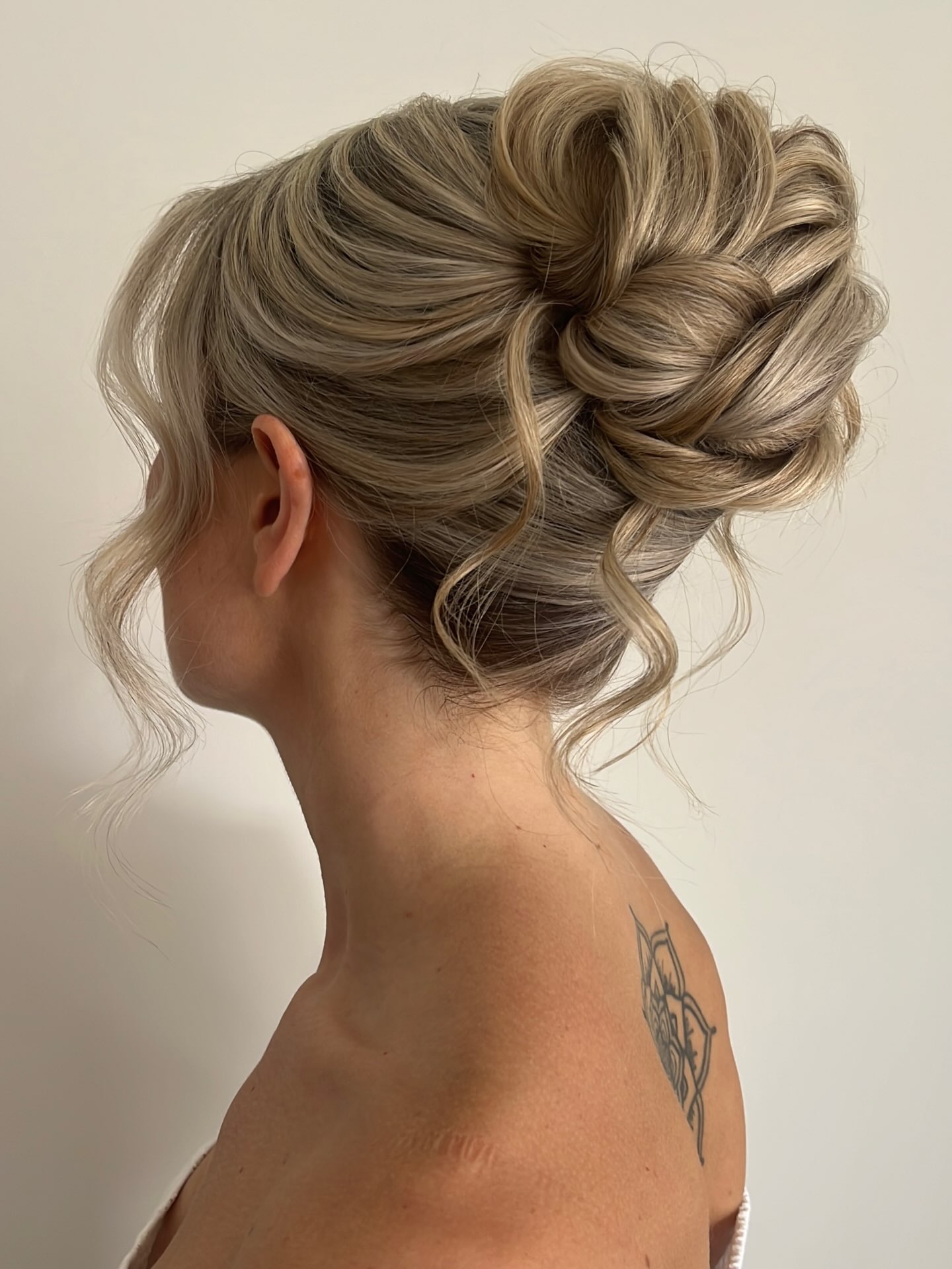 Voluminous Chignon With Textured Waves