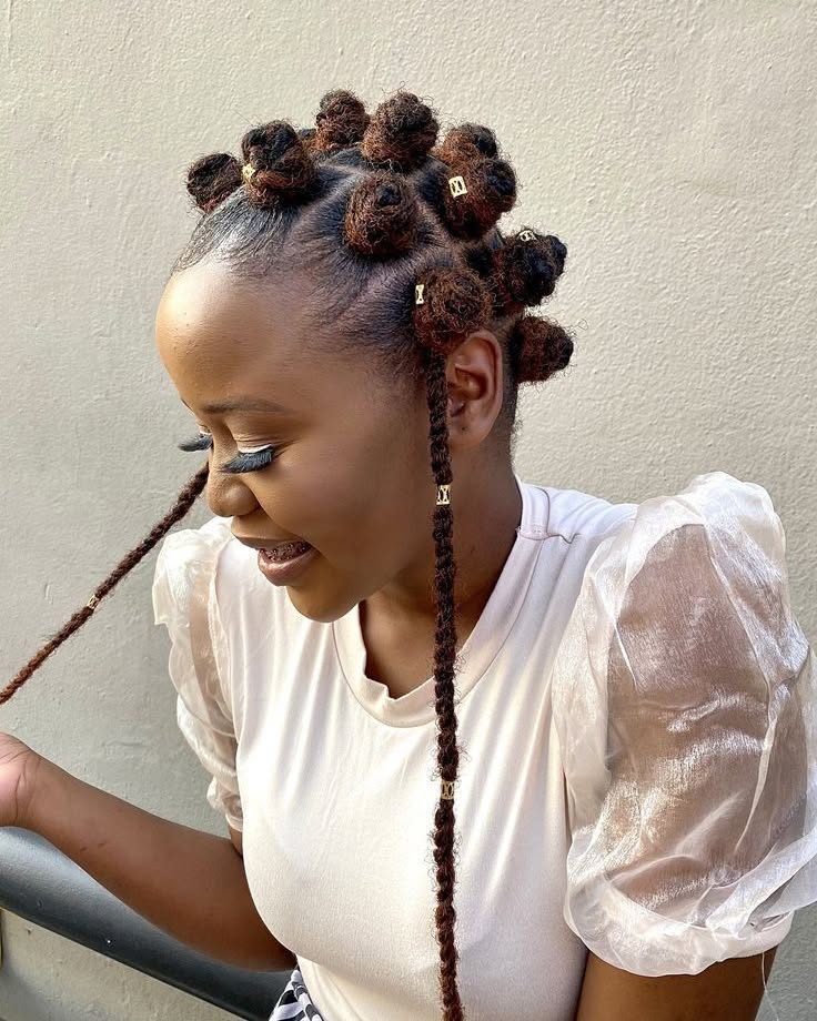 Golden Accented Bantu Knots With Braids