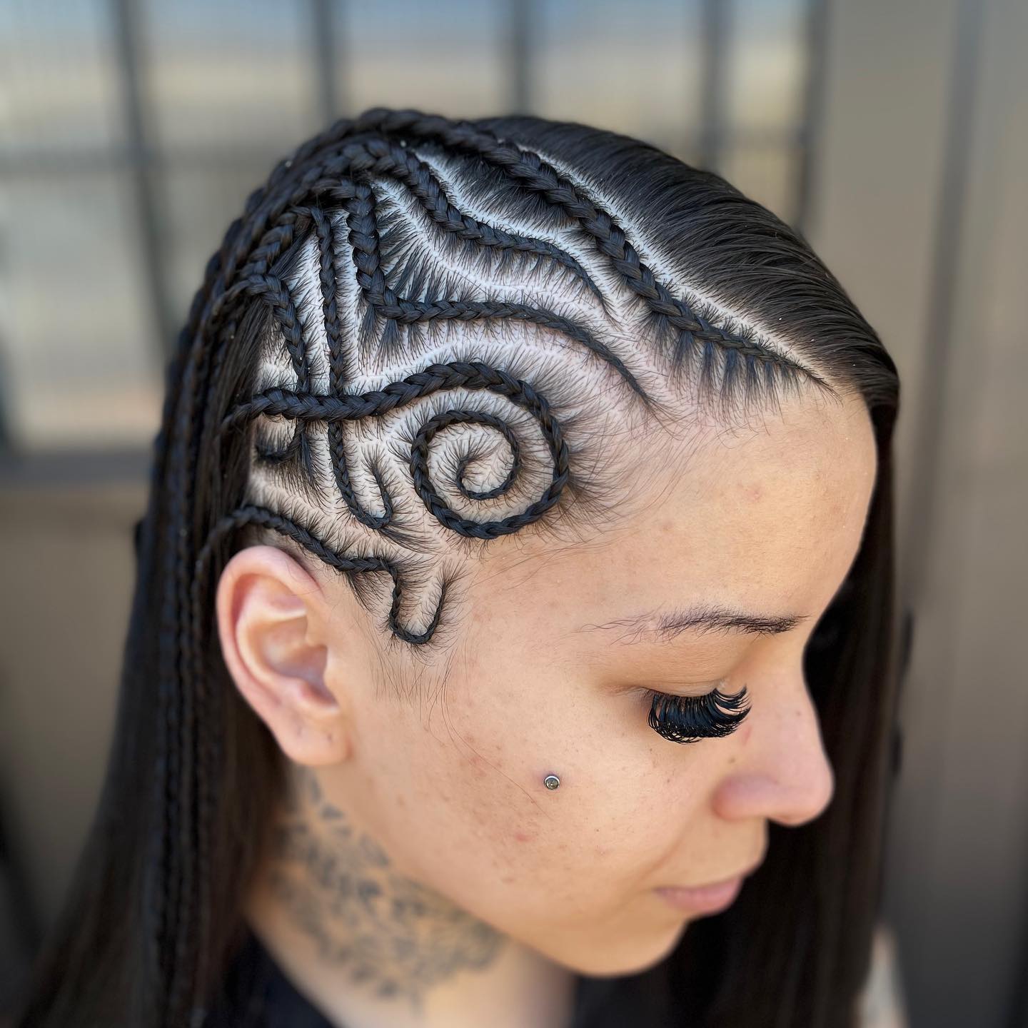 Intricate Swirl Cornrows With Defined Edges
