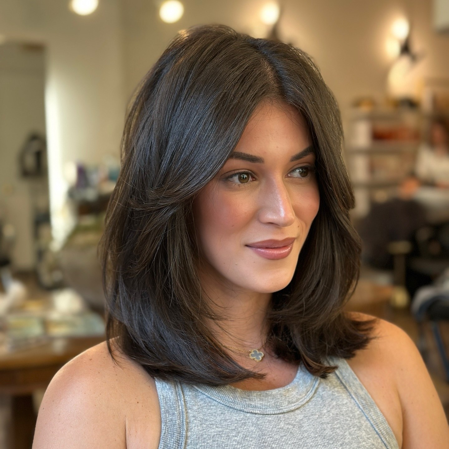 Brunette Collarbone Cut With Face-Framing Layers