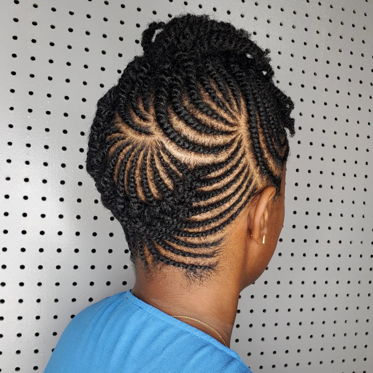 Intricate Flat Twist Updo With Swirl Pattern