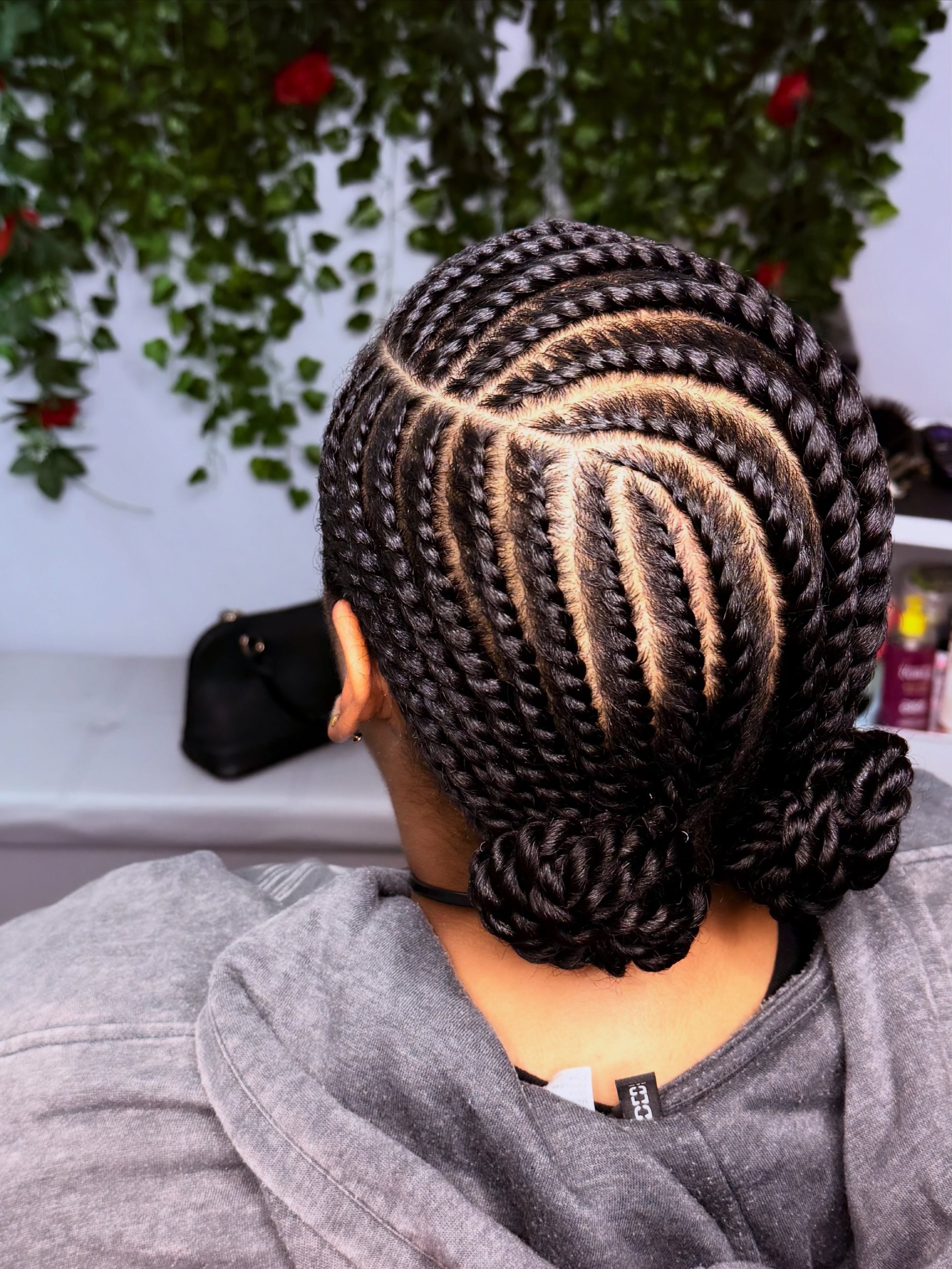 Chic Swirl Flat Twists with Double Buns