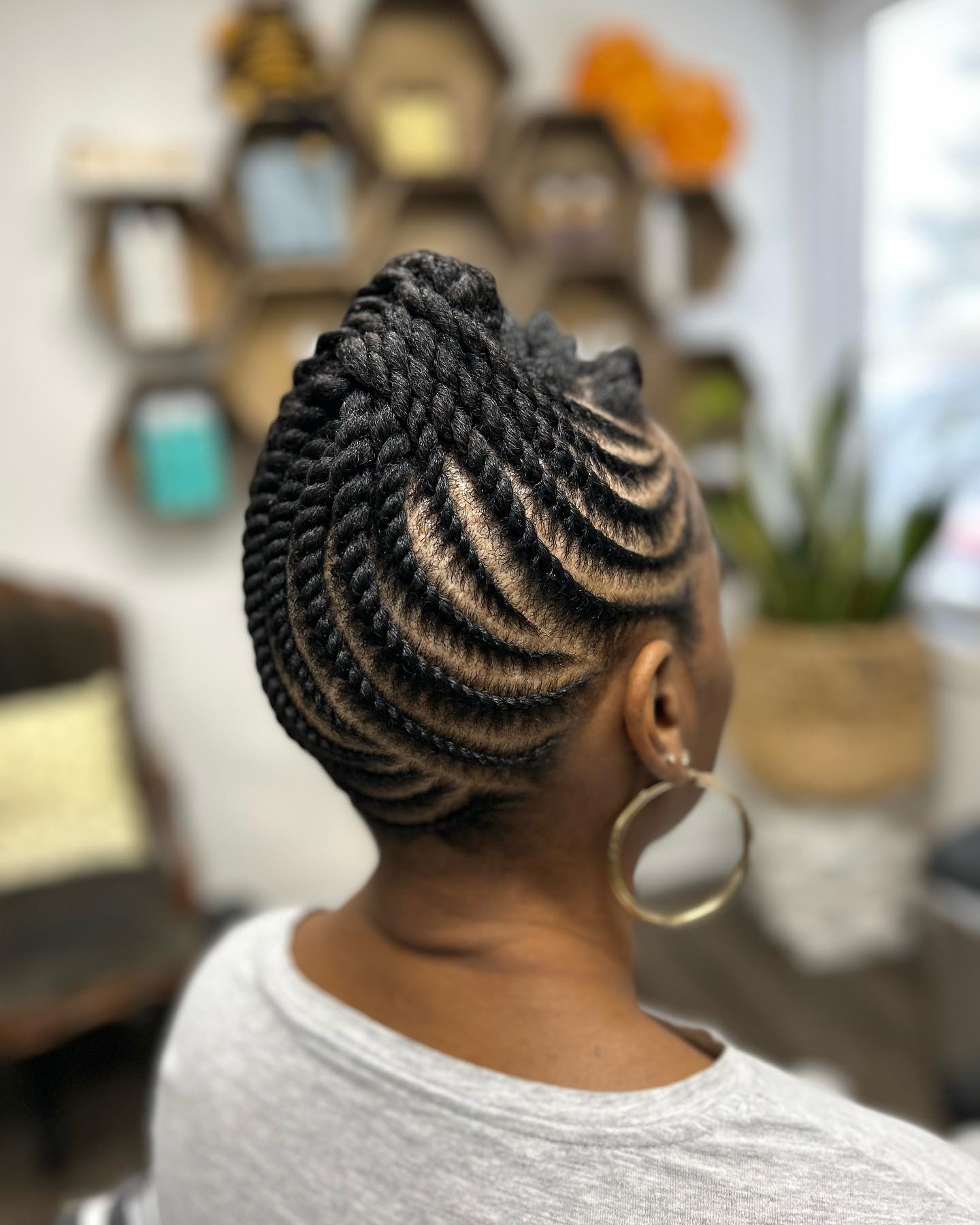 Elegant Flat Twists Updo With Defined Coils