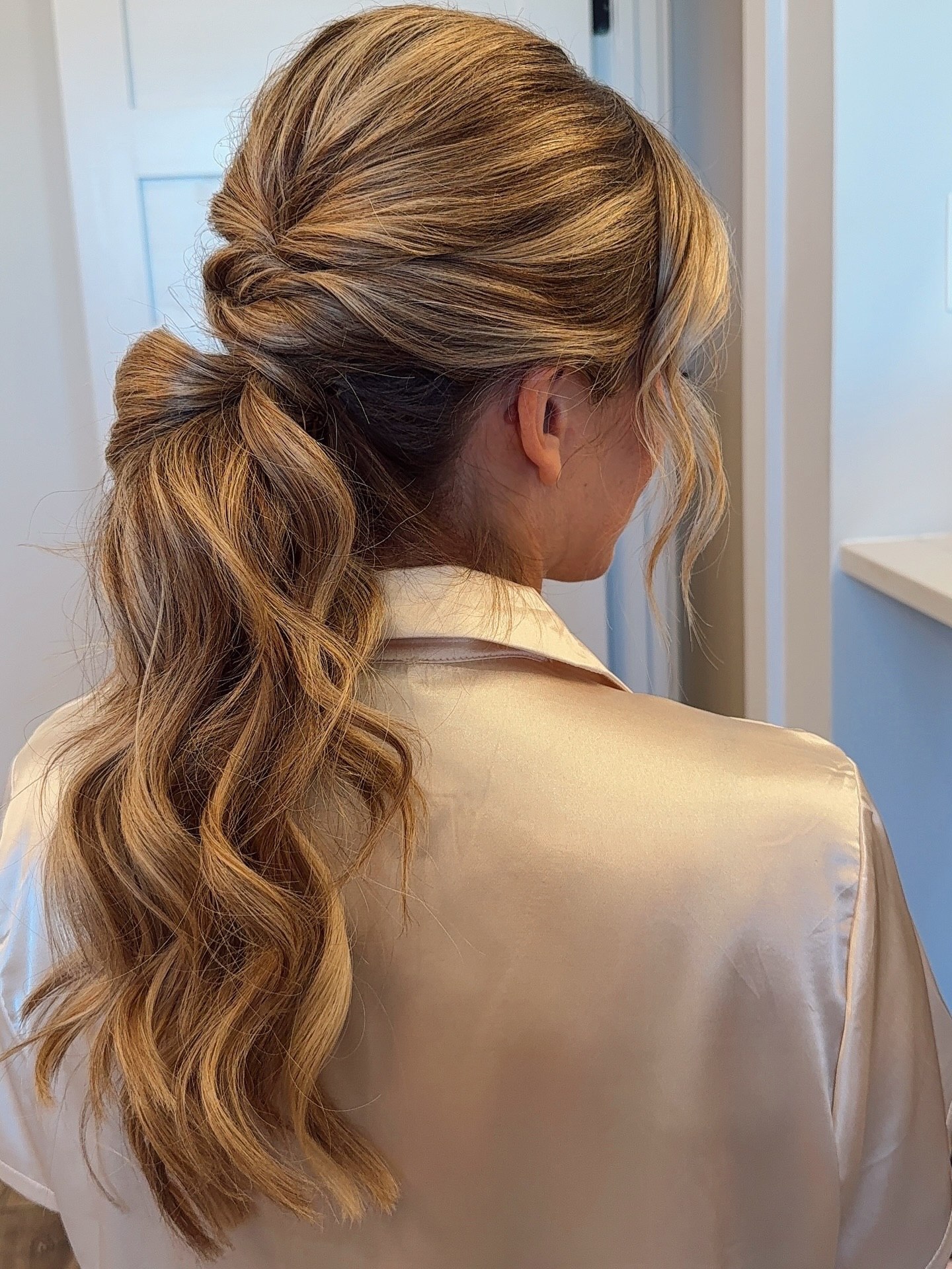 Elegant Braided Updo With Loose Curls