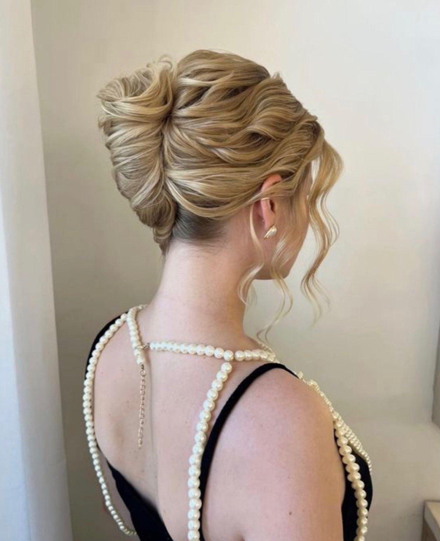 Elegant Chignon With Voluminous Curls