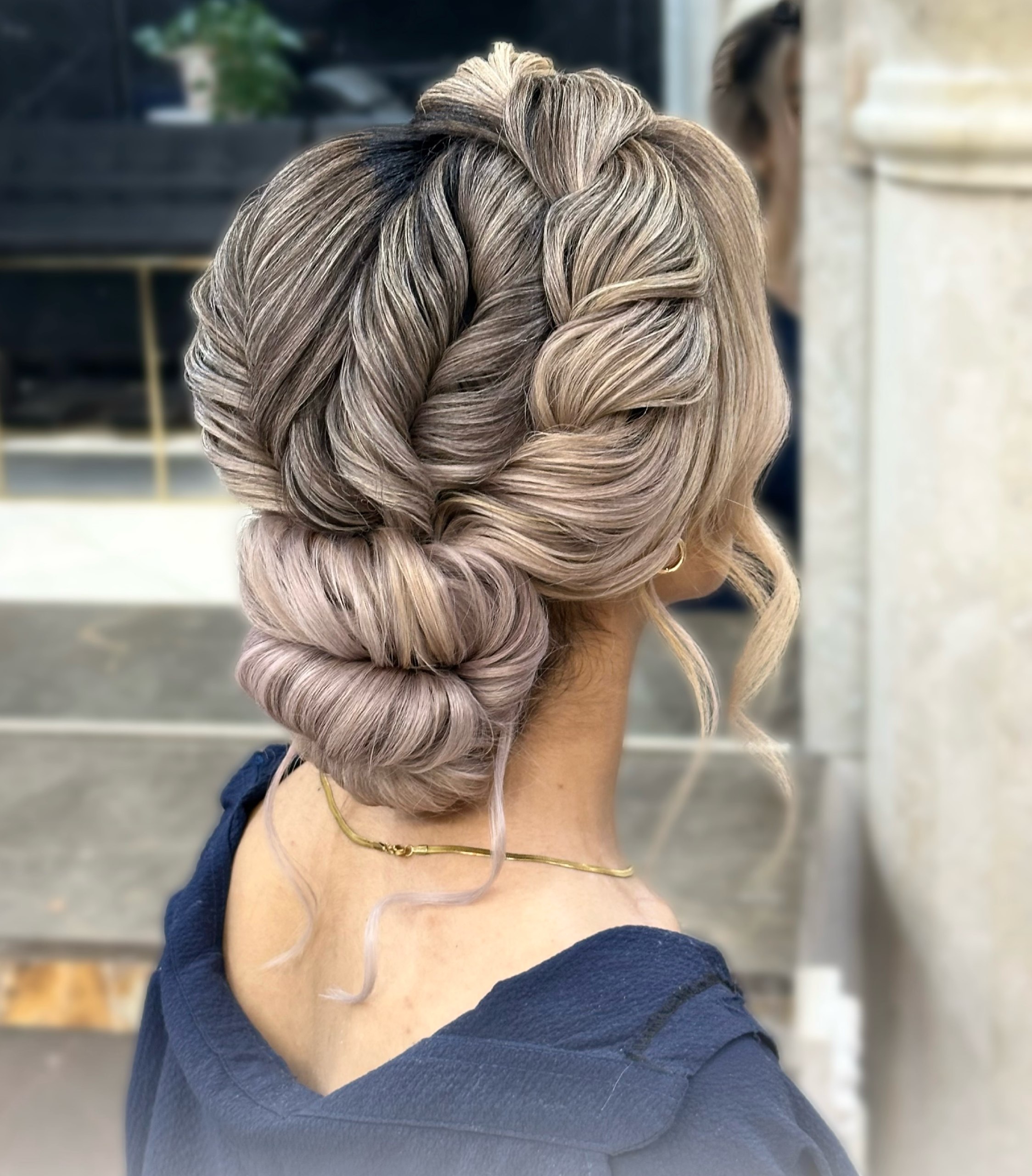 Braided Updo With Voluminous Low Bun