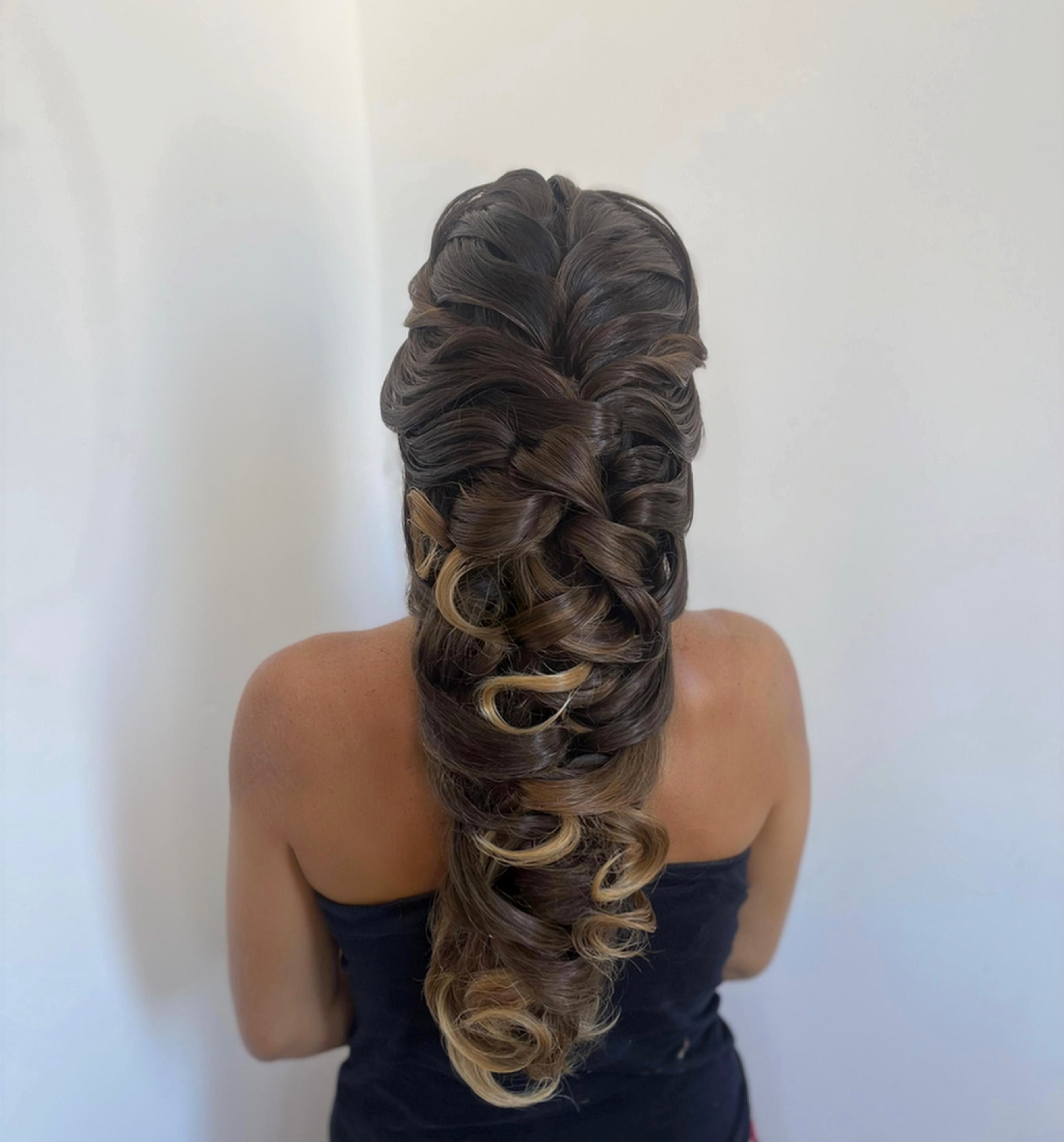 Elegant Braided Updo With Loose Curls For Prom