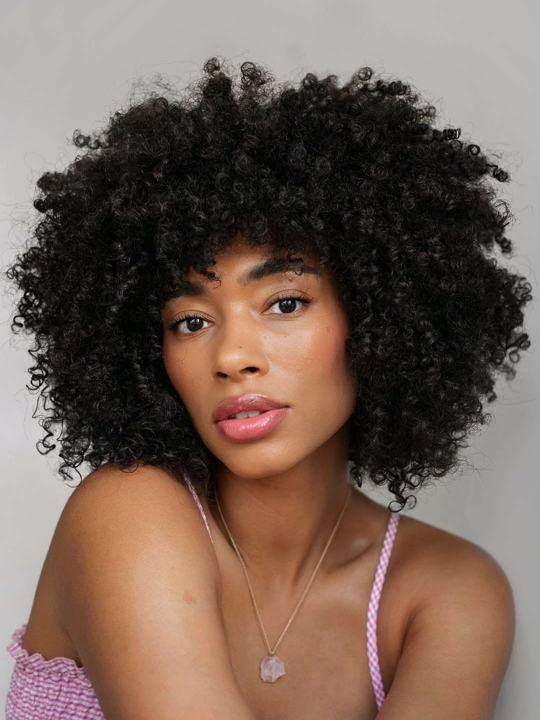Defined Voluminous Coils With Natural Dark Hue
