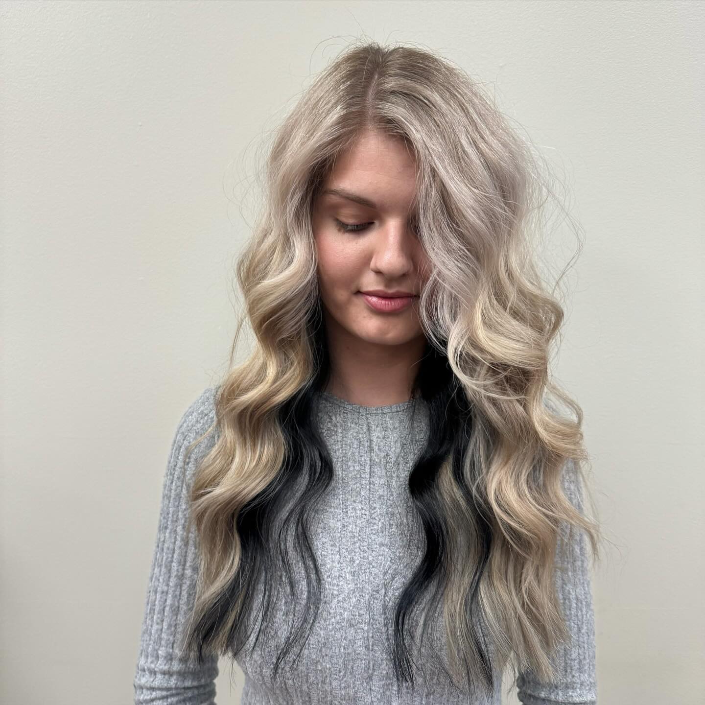Blonde Waves with Bold Black Peekaboo Highlights