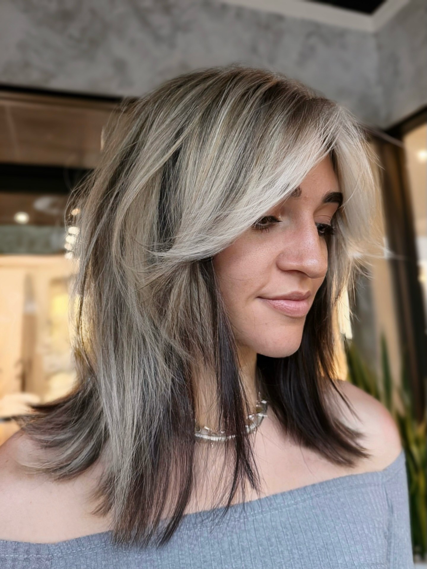 Layered Lob With Bold Black And Blonde Highlights
