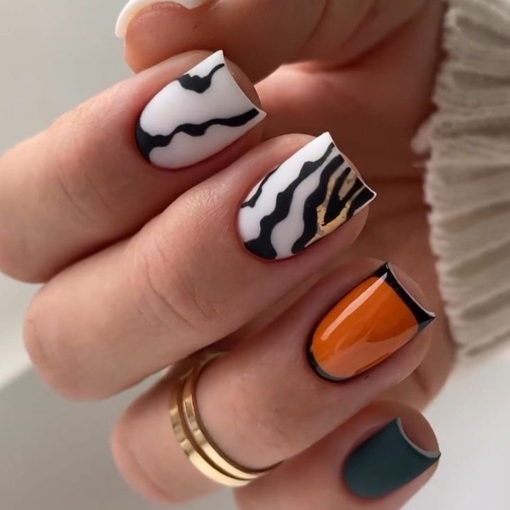 Abstract Animal Print French Tip Manicure