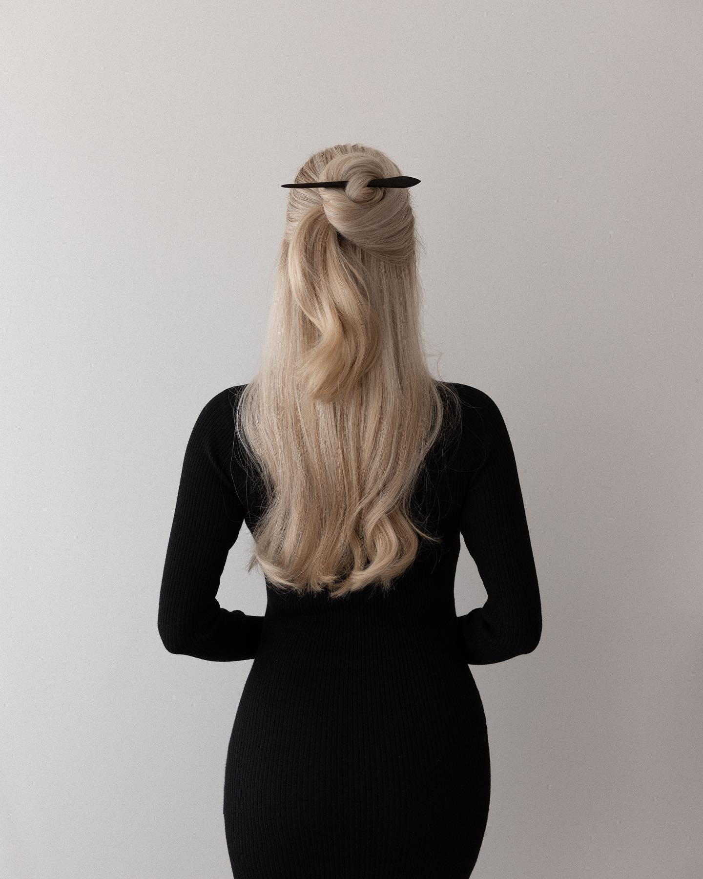 Chic Twisted Half-Up Bun With Hair Stick
