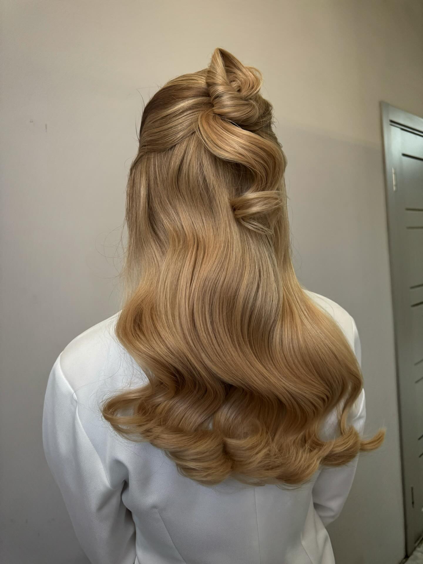 Elegant Twisted Half-Up Blonde Waves