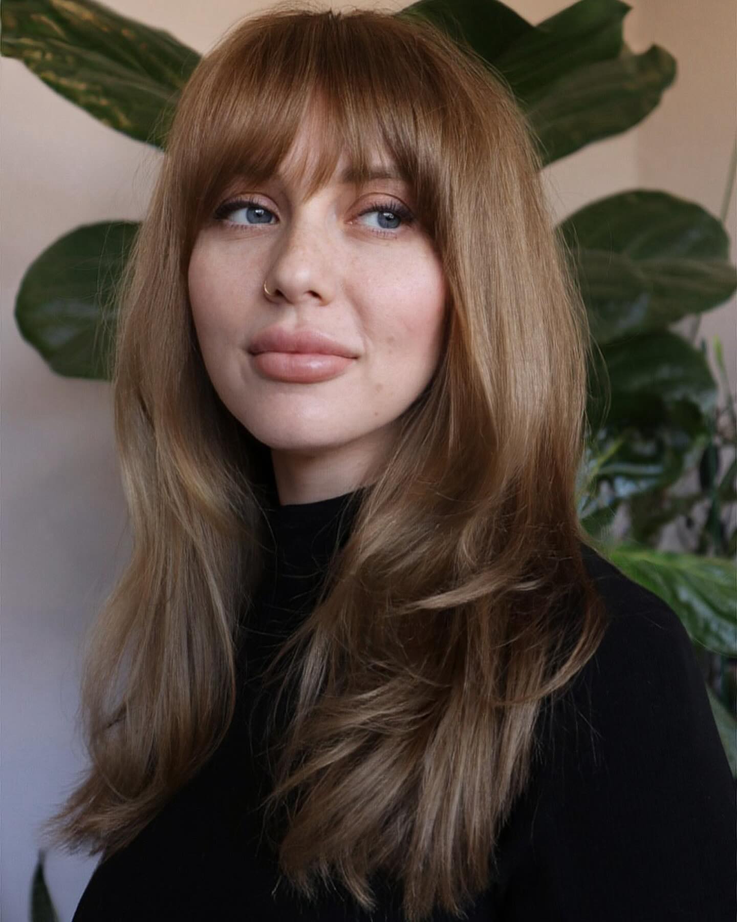 Wispy Bangs With Soft Honey Blonde Layers
