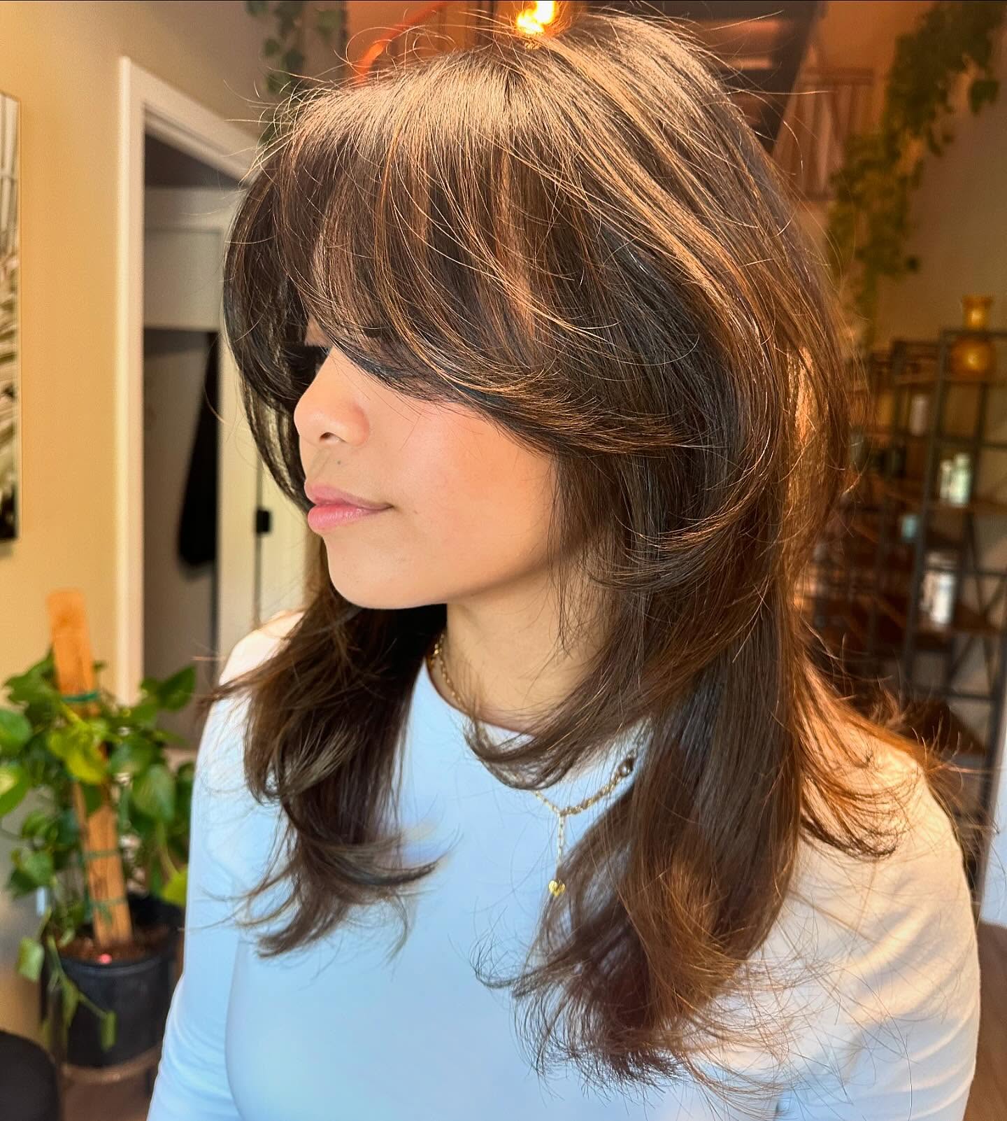 Soft Layered Cut With Face-Framing Curtain Bangs
