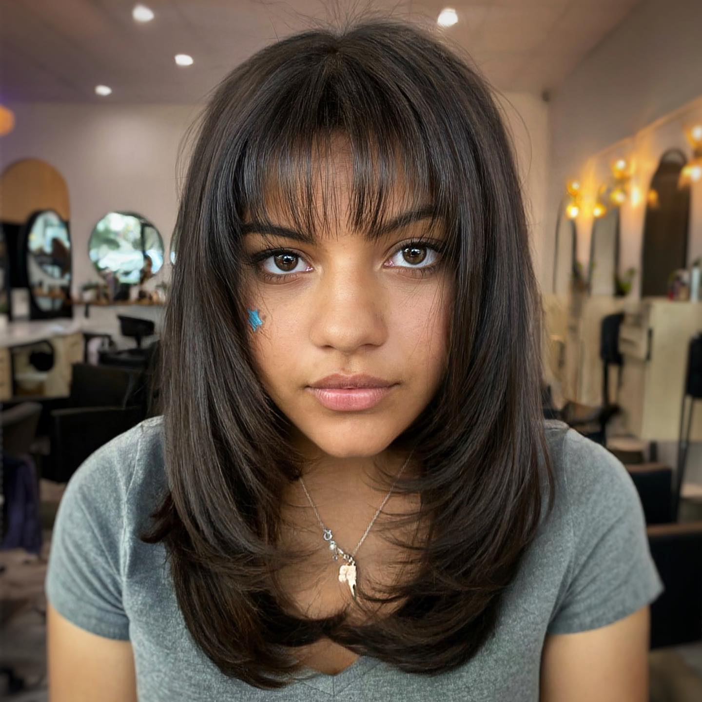 Face-Framing Layers With Wispy Bangs