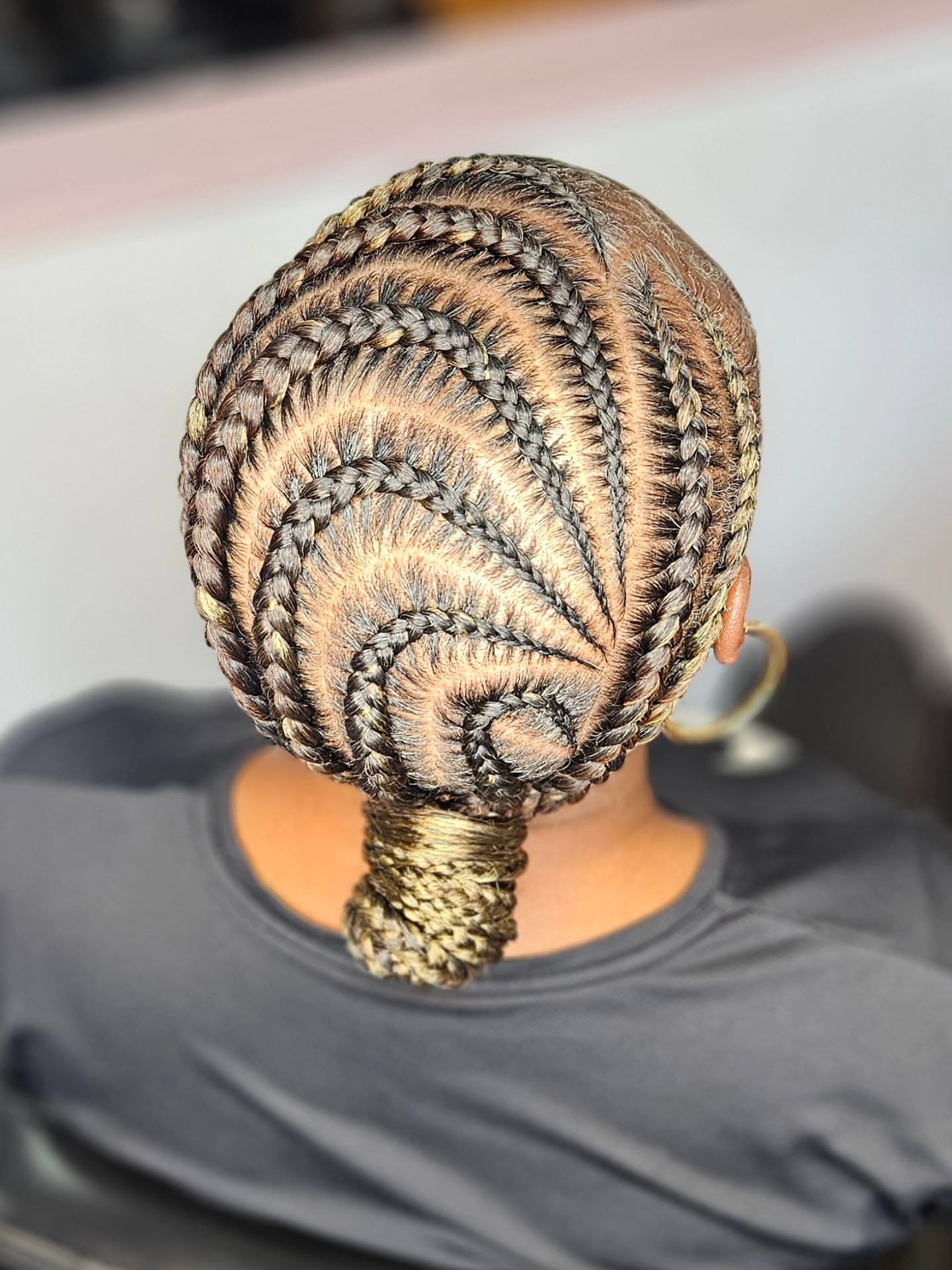 Artistic Swirl Cornrows With Golden Blonde Tips