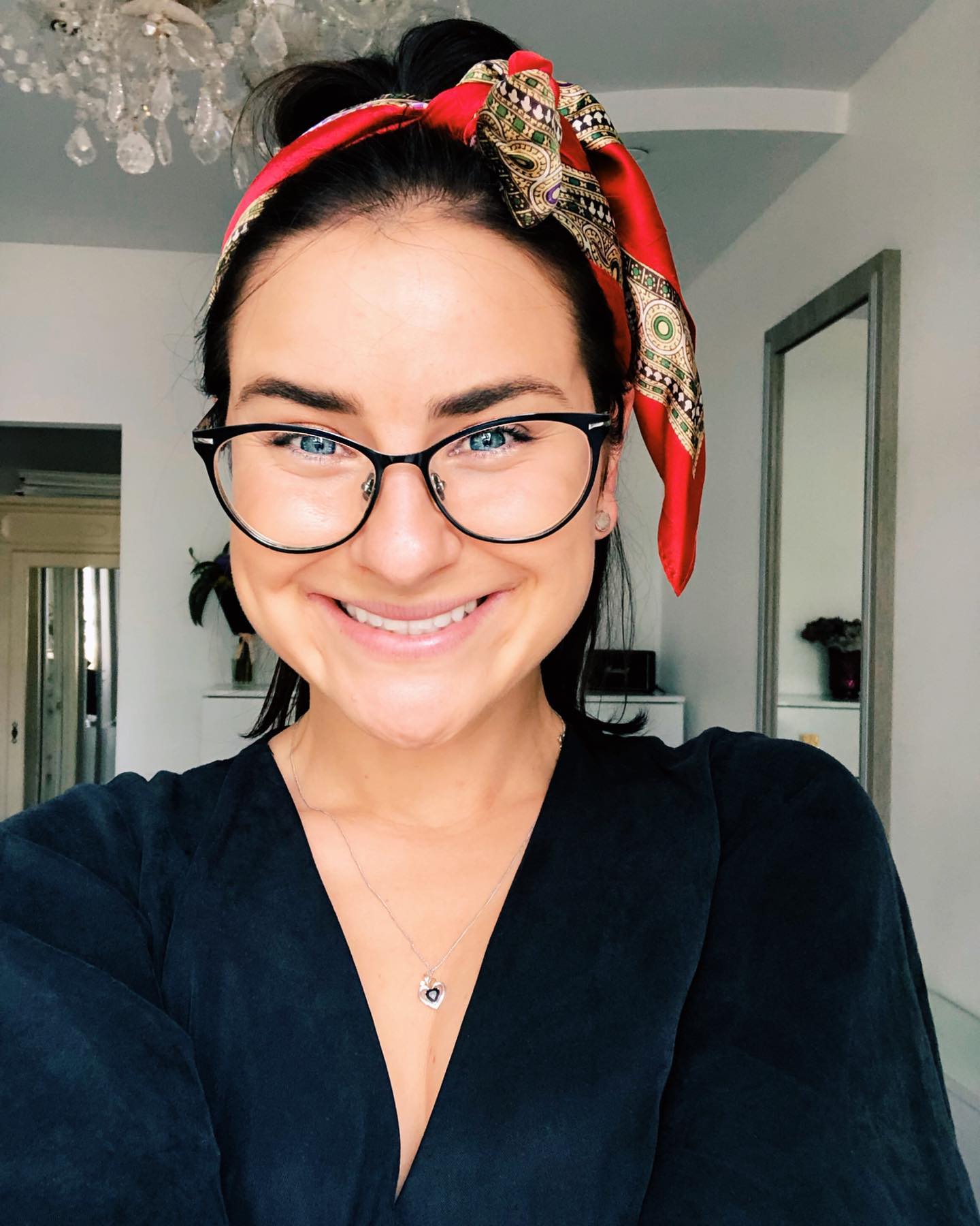Chic High Bun With A Vintage Silk Scarf