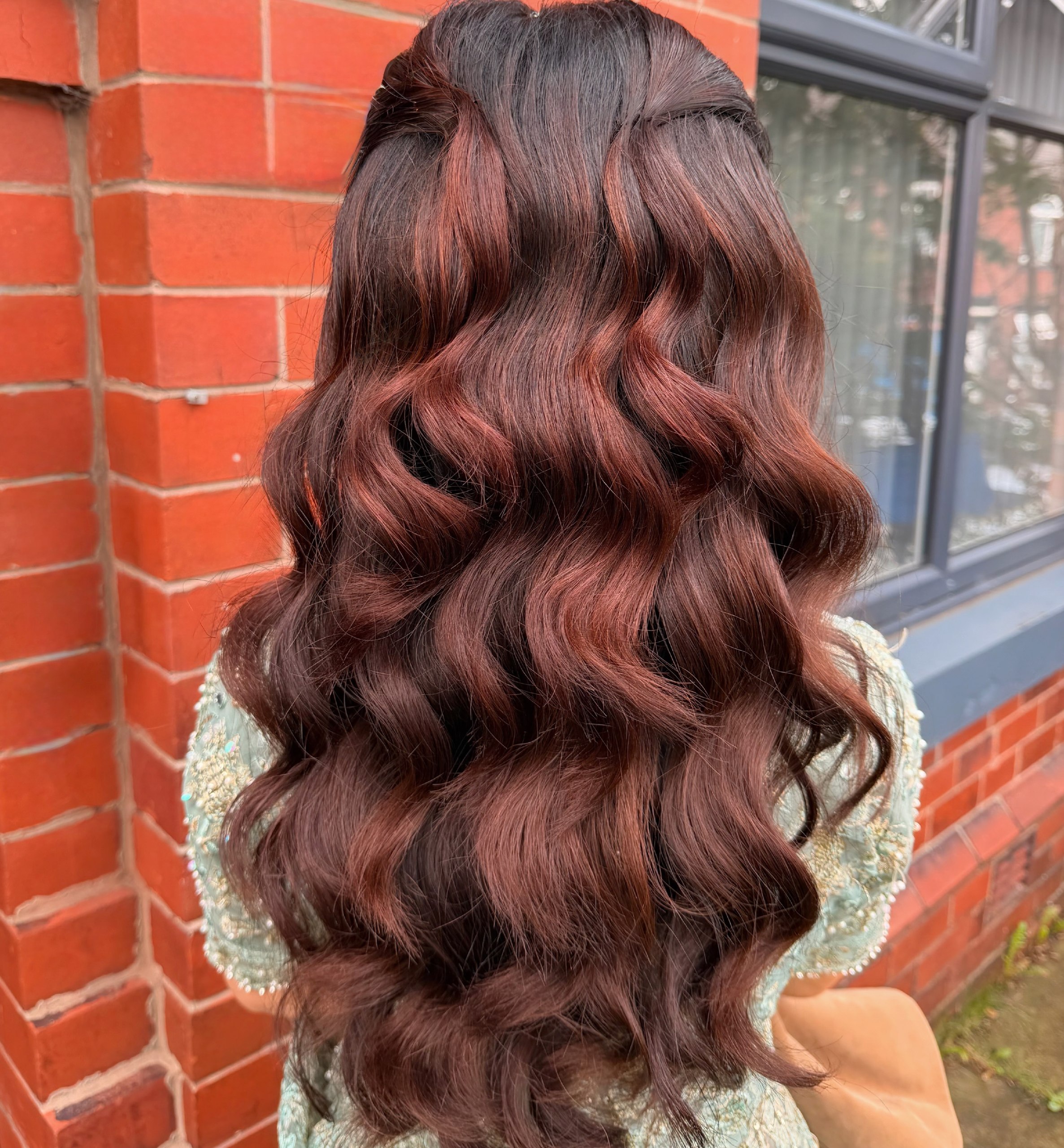 Deep Burgundy Waves With Half-Up Twist