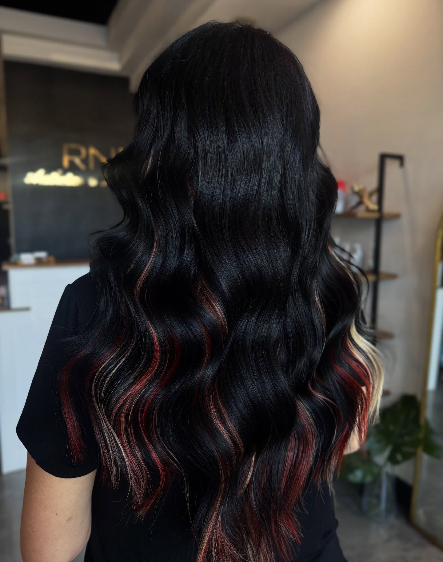 Black Hair With Bold Red and Blonde Highlights