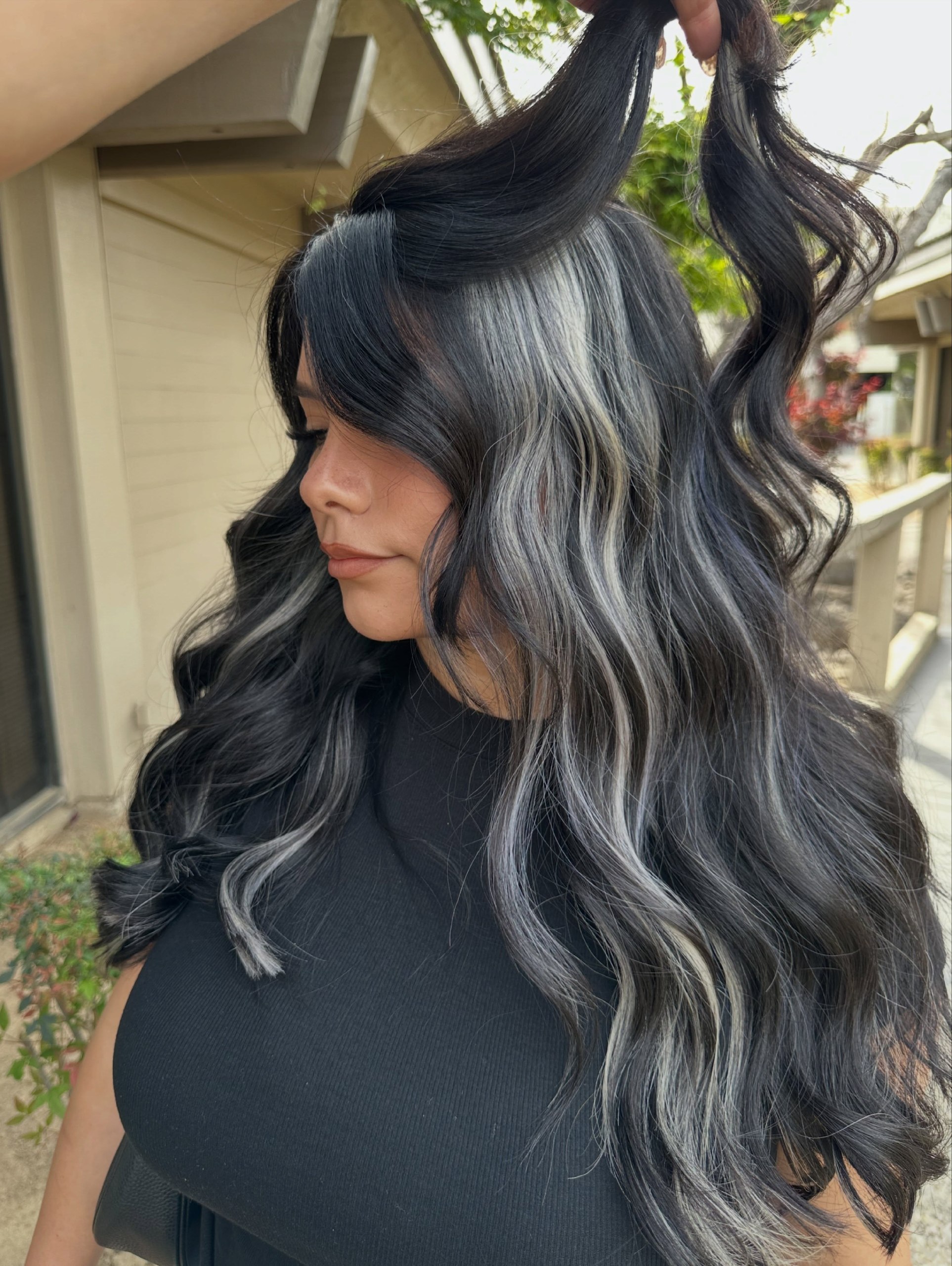 Dramatic Streaks On Long Wavy Black Hair