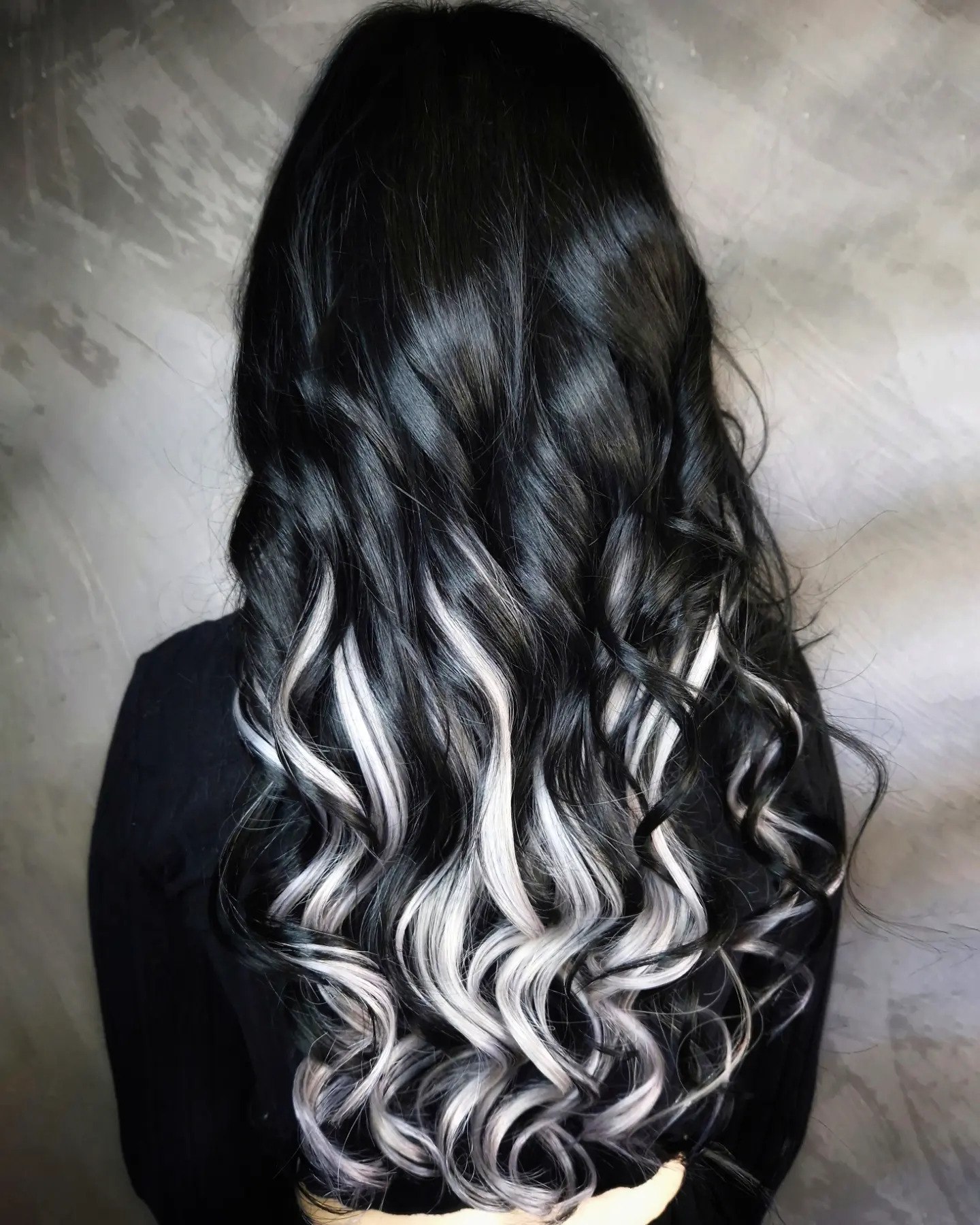Dramatic Black Hair With Silver Streaks