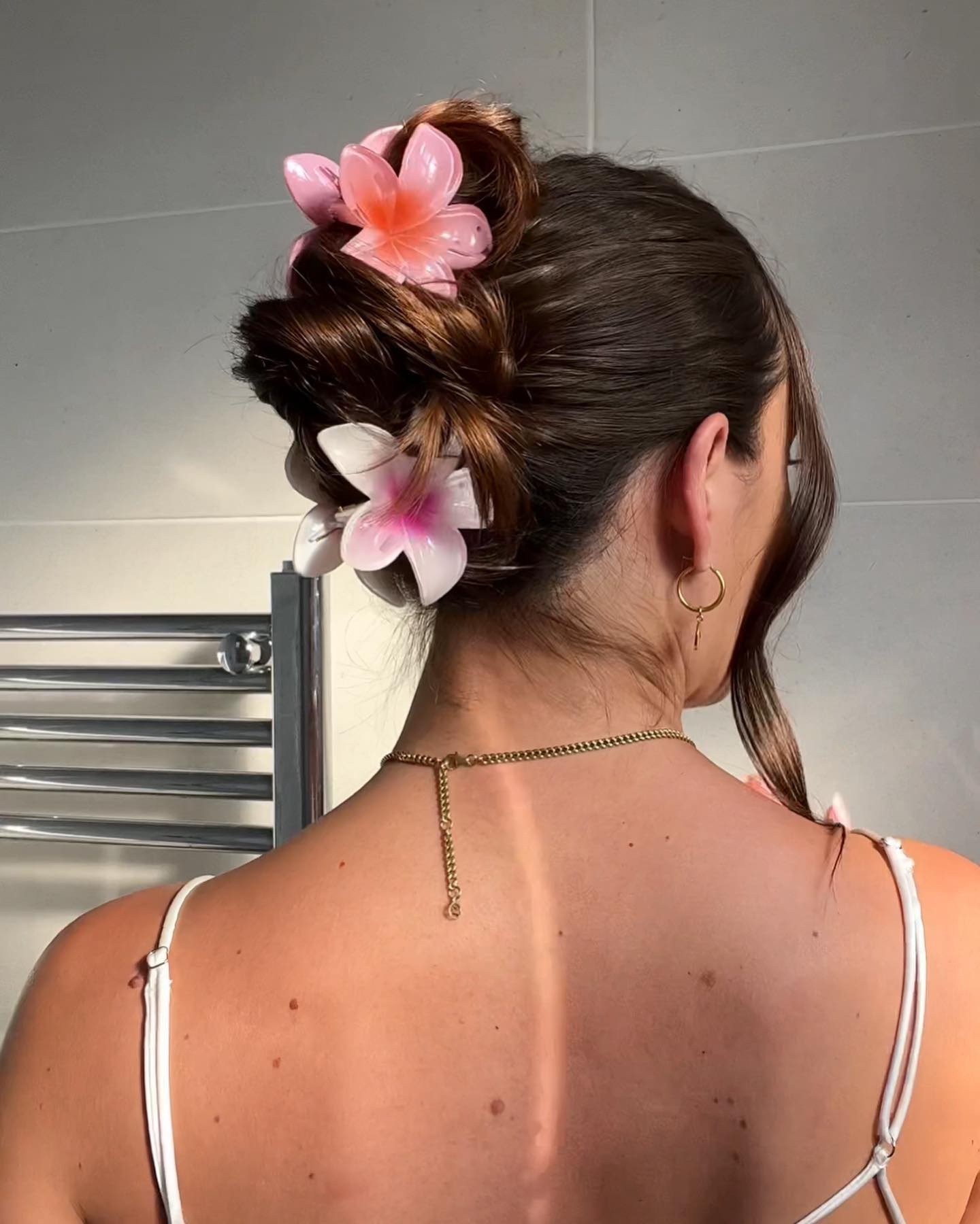 Tropical Updo With Flower Hair Clips