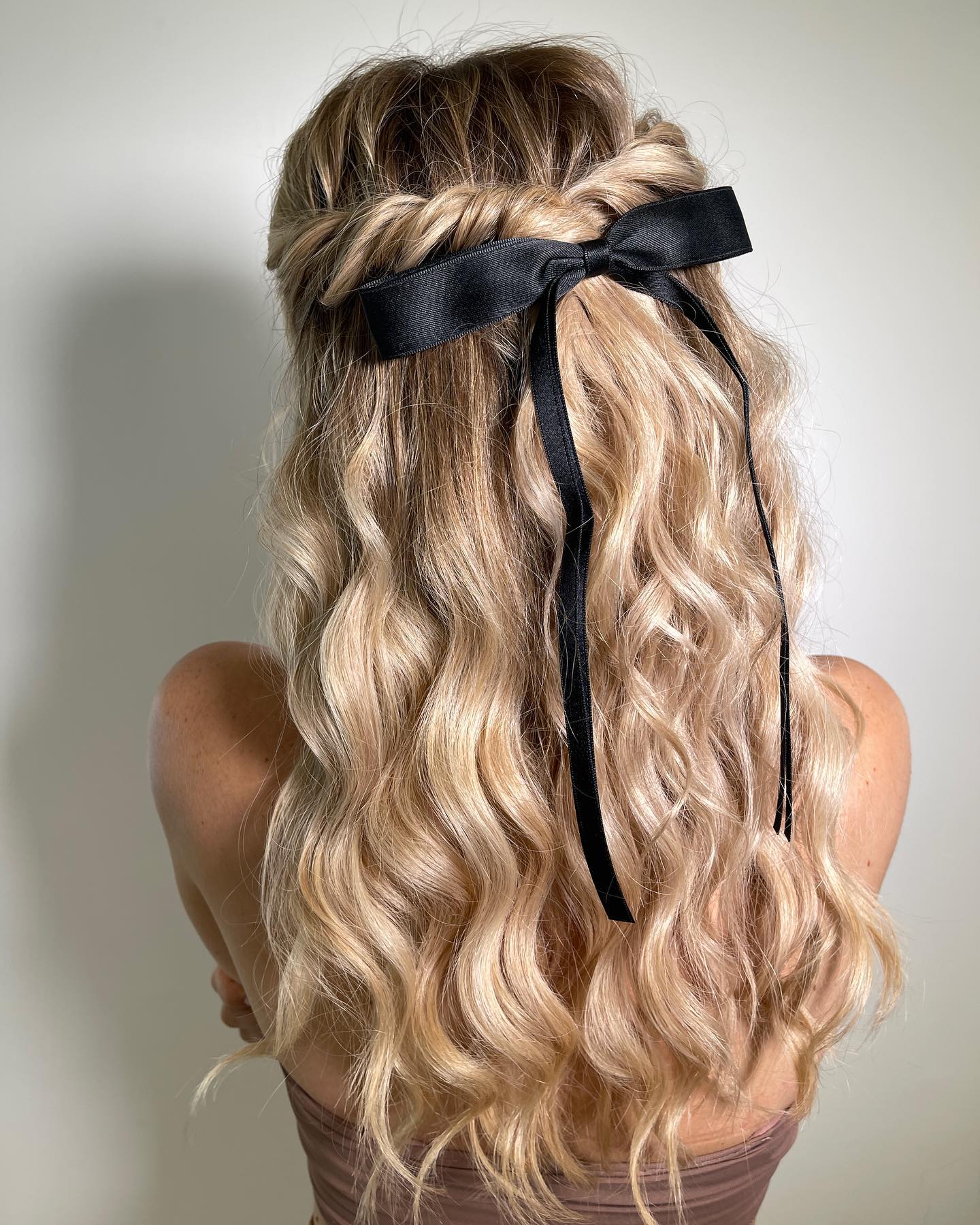 Braided Half-Up With Romantic Waves & Black Bow