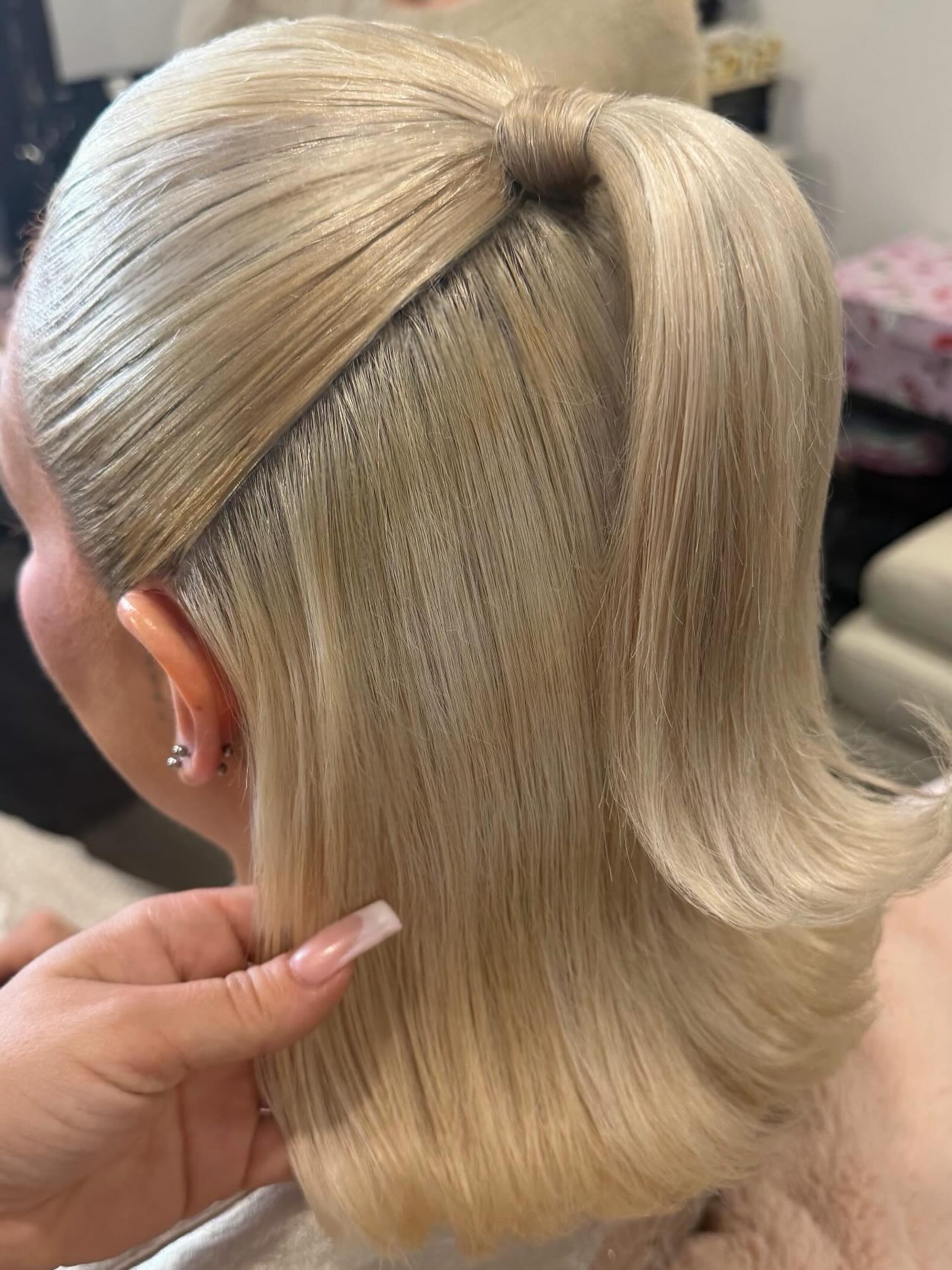 Sleek High Ponytail With Flipped Ends