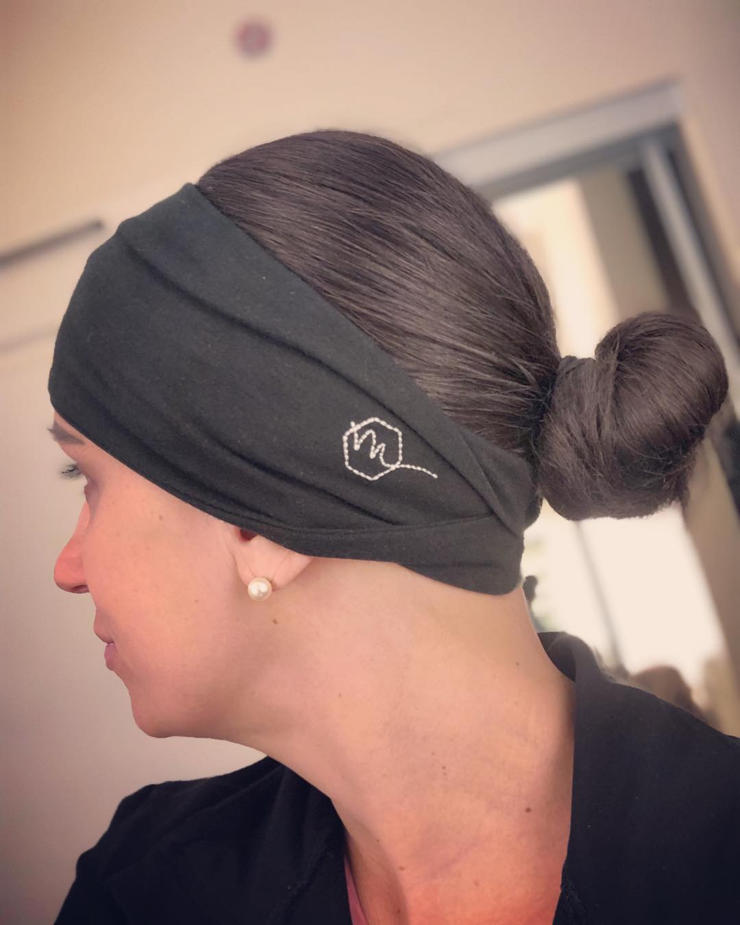 Sleek Low Bun With Headband Gym Style