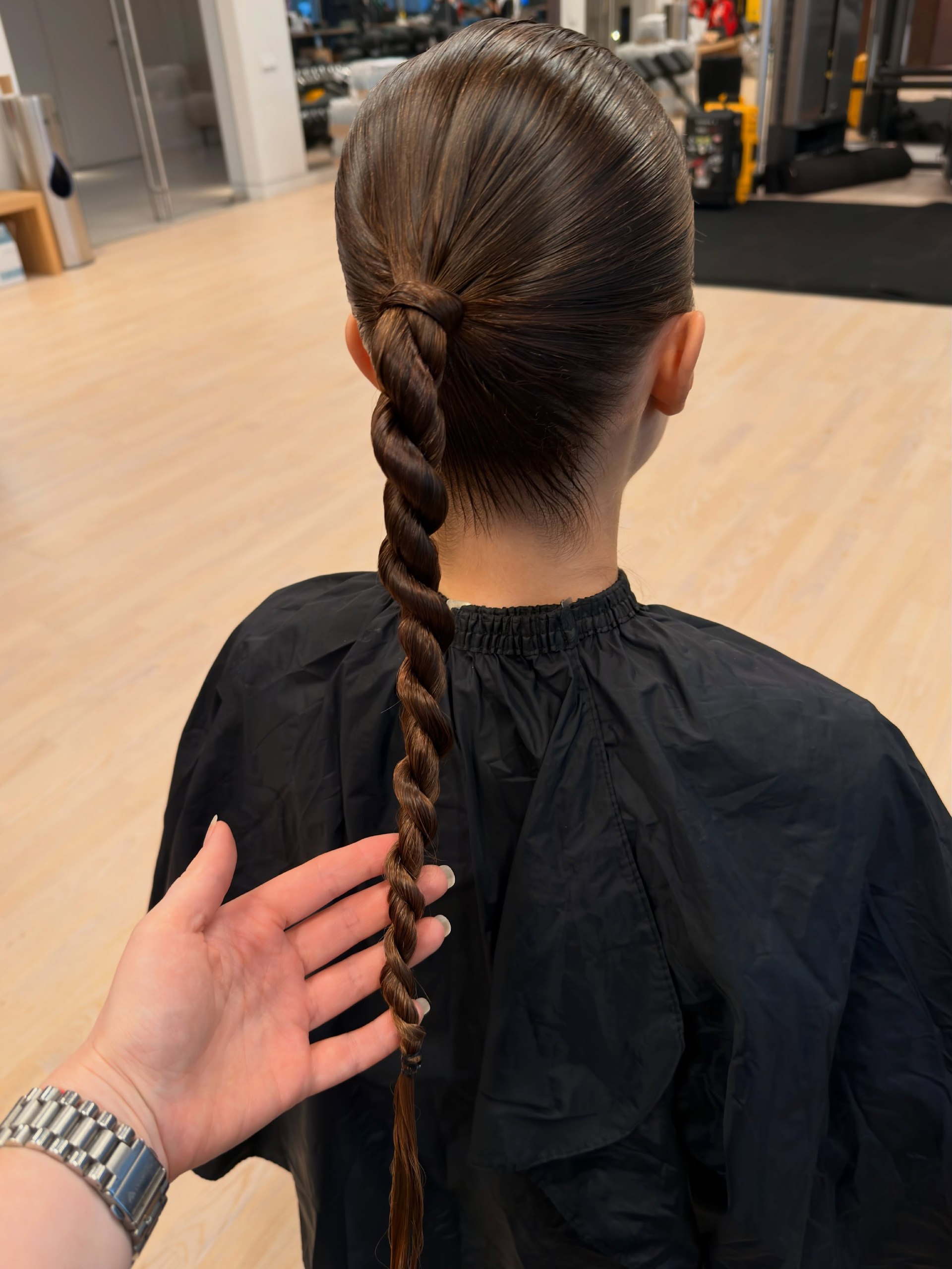 Sleek Twisted Gym Ponytail With Deep Part
