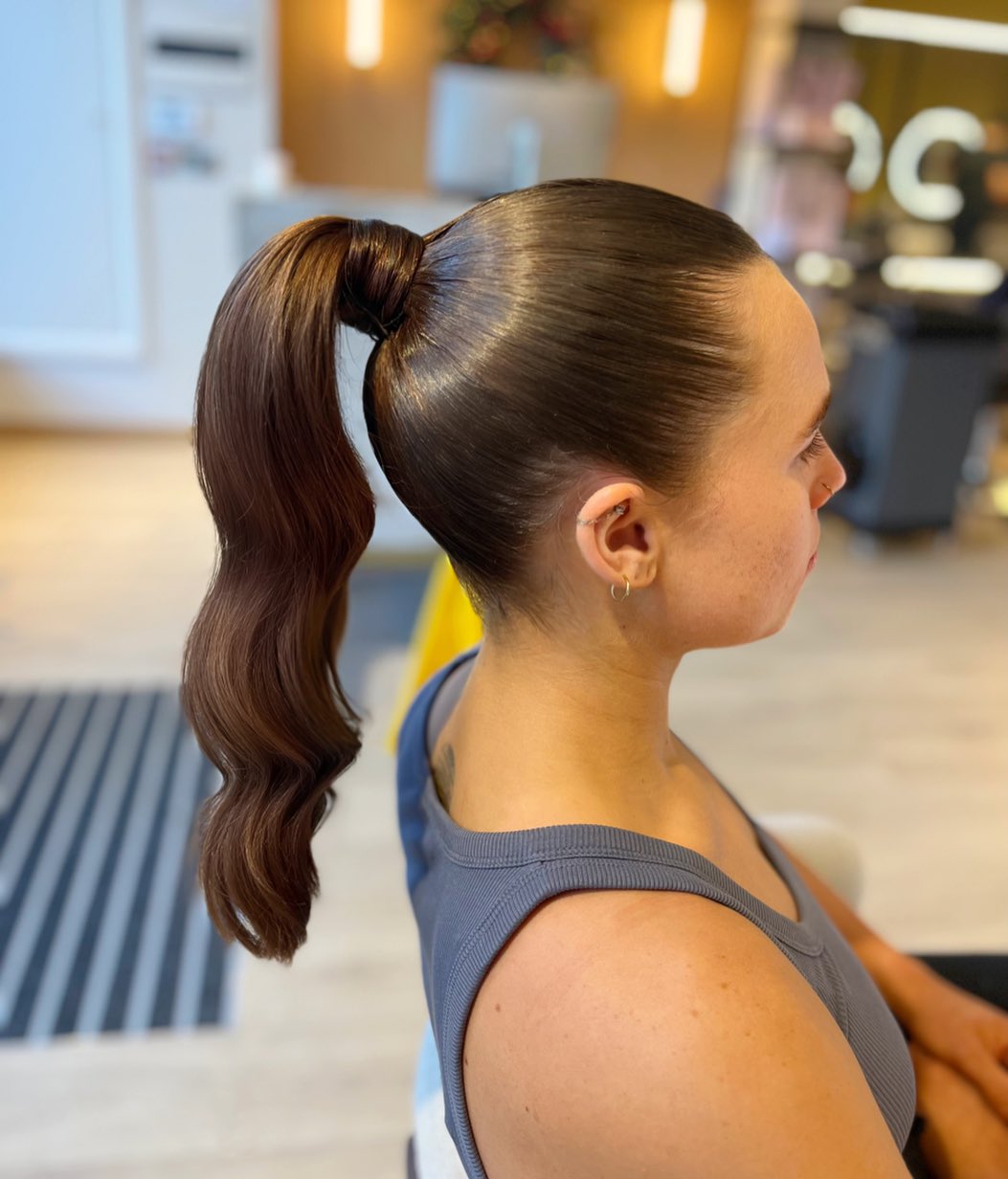 Sleek High Ponytail With Polished Waves