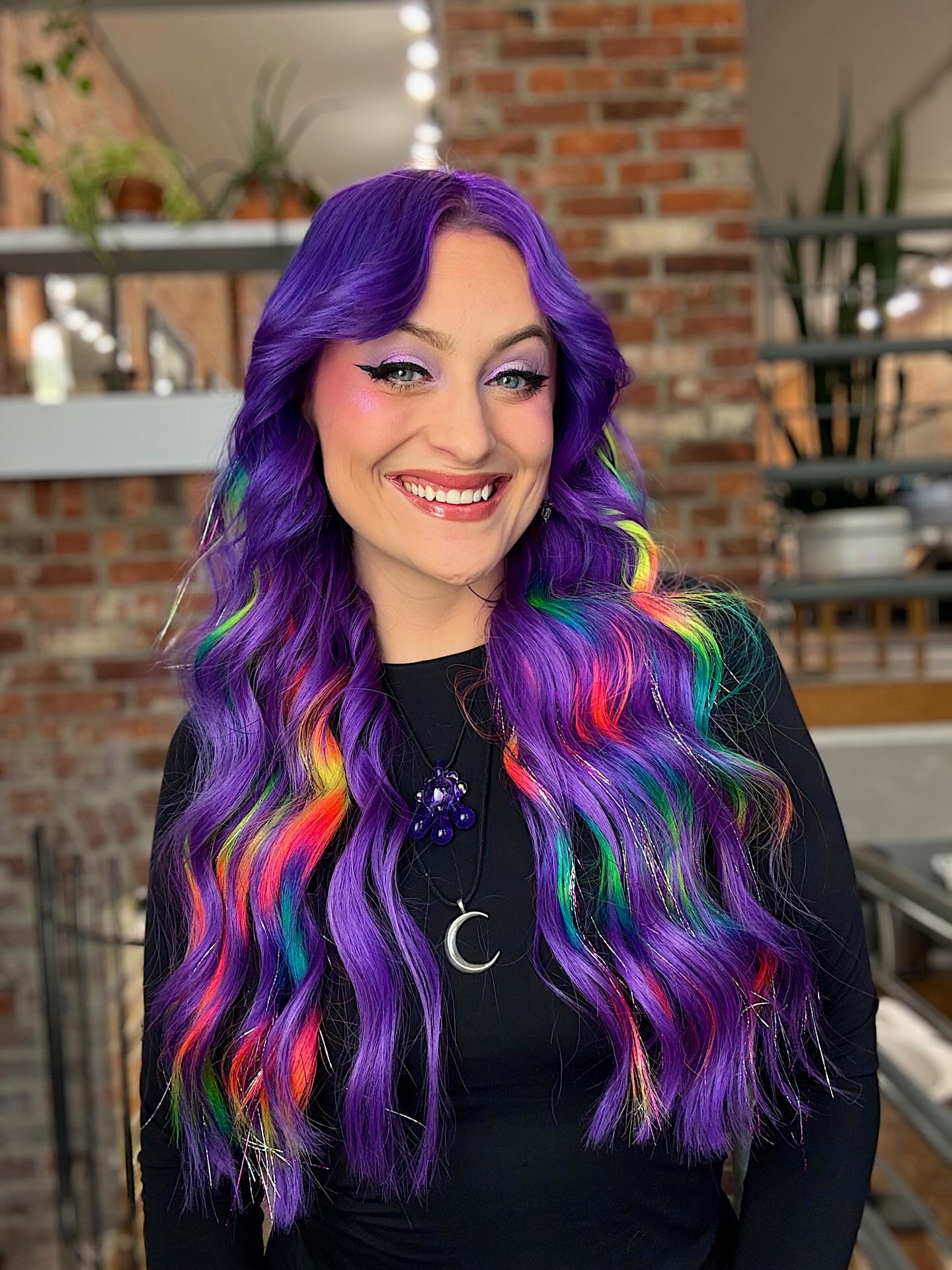 Vibrant Purple Hair With Rainbow Streaks