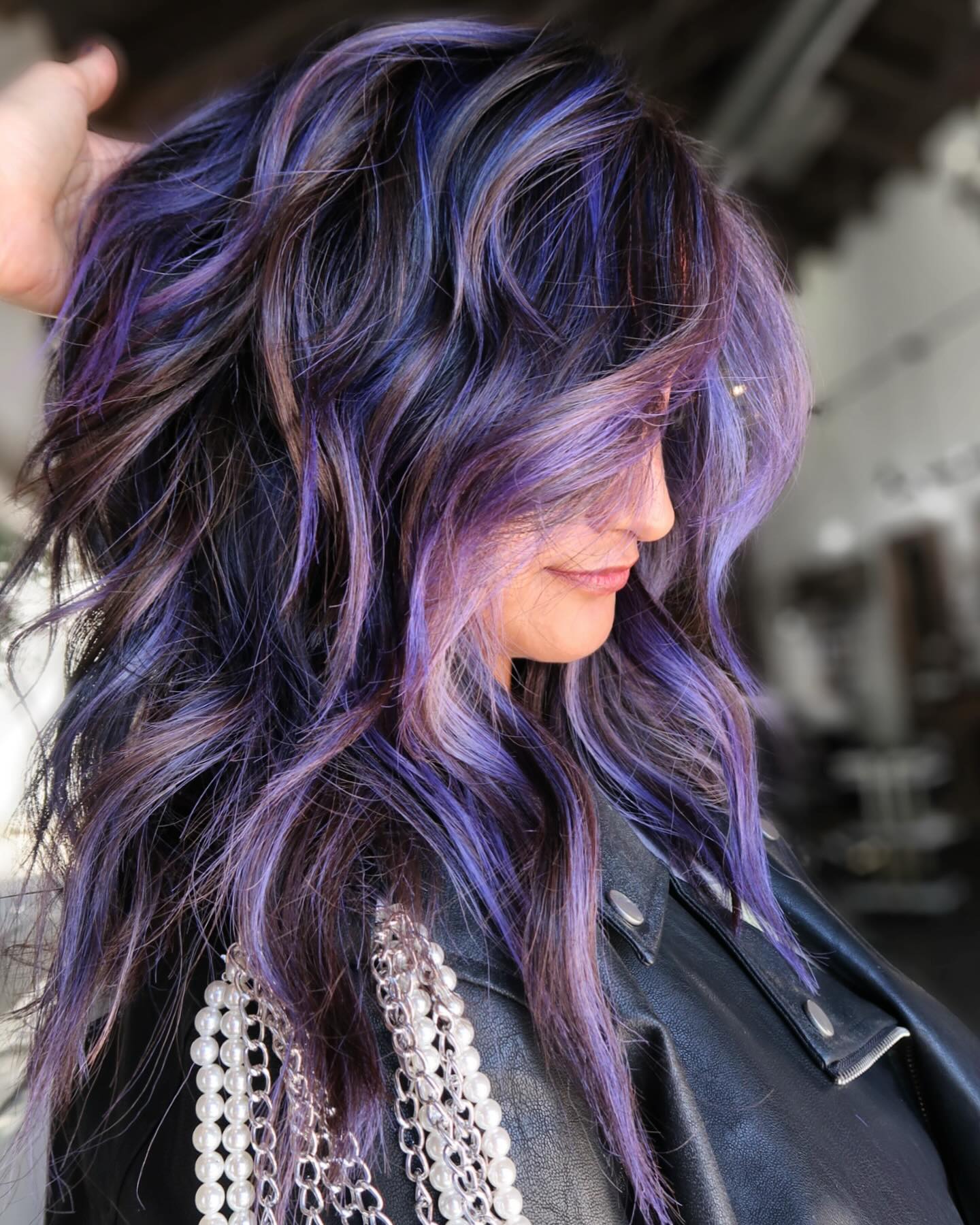 Moody Plum Streaks On Dark Wavy Hair
