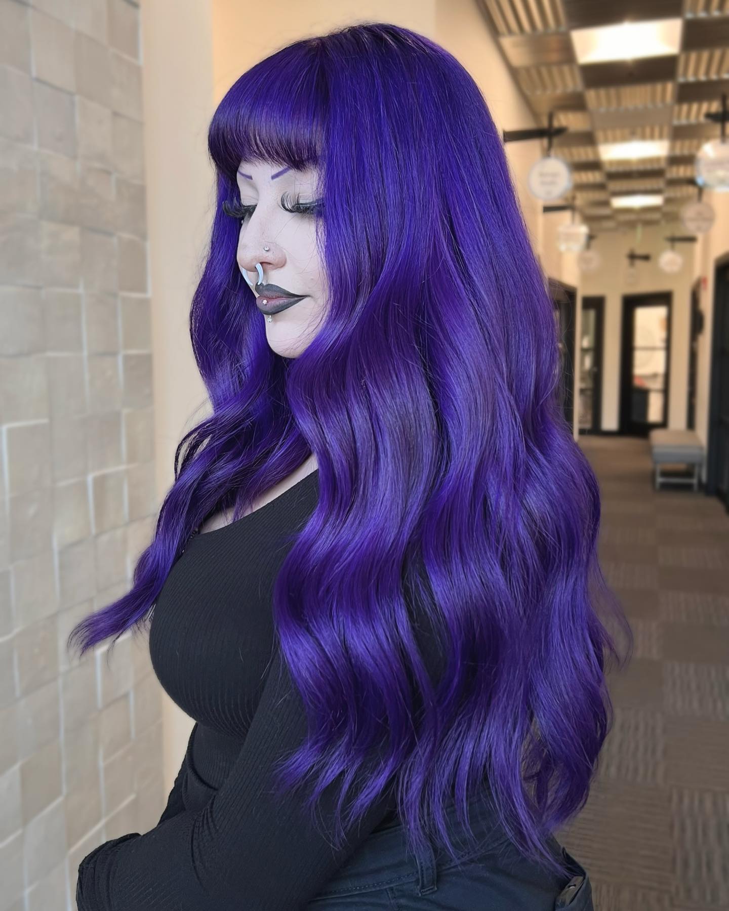 Vibrant Purple Waves With Wispy Bangs
