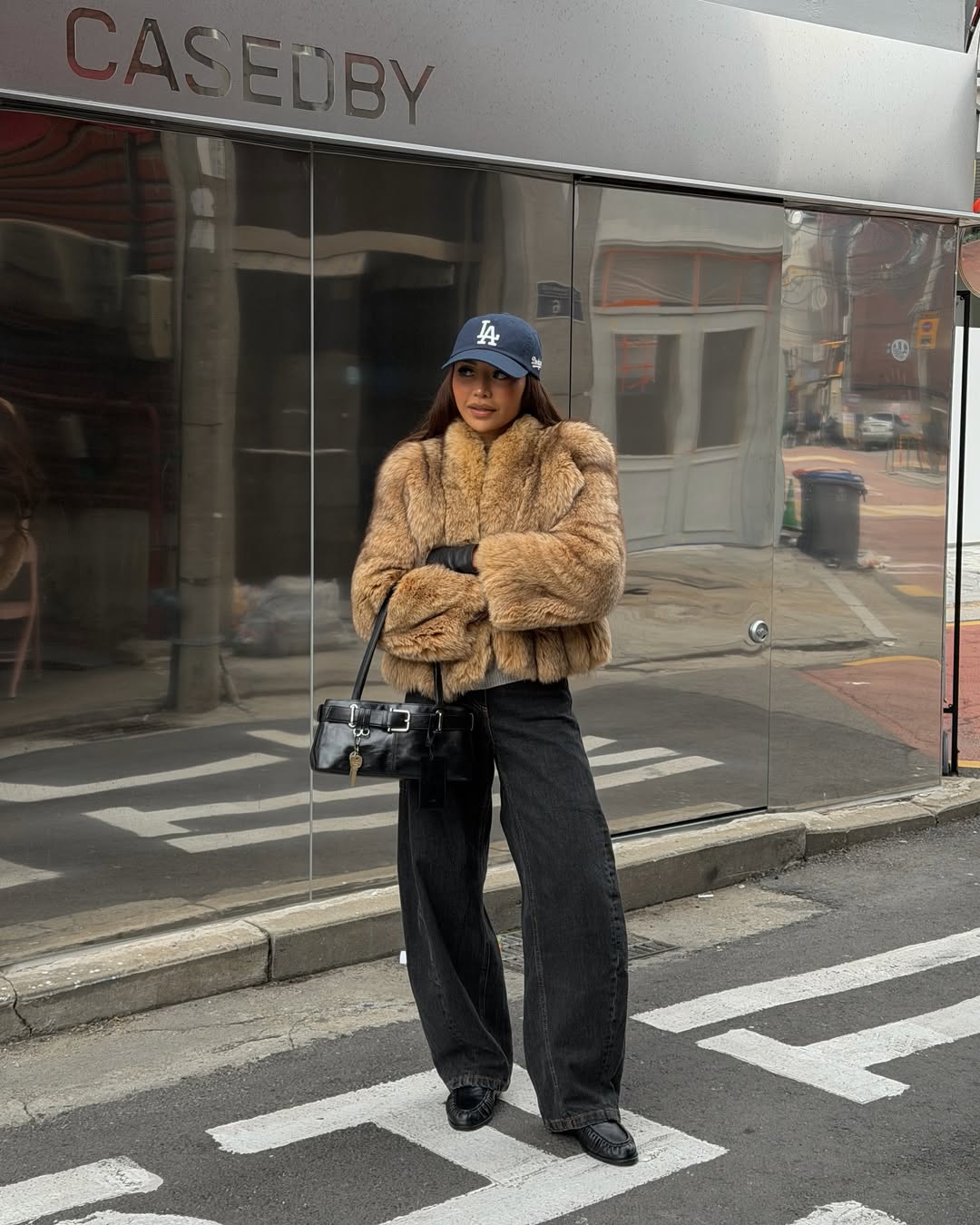 Faux Fur Coat With Wide Leg Jeans And Baseball Cap