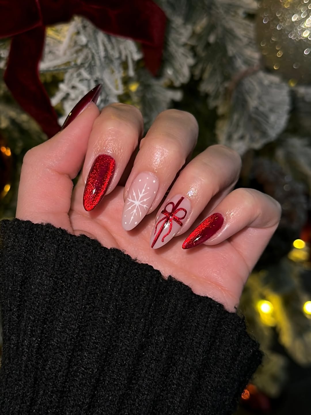 Festive Red Sparkle And Snowflake Almond Nails