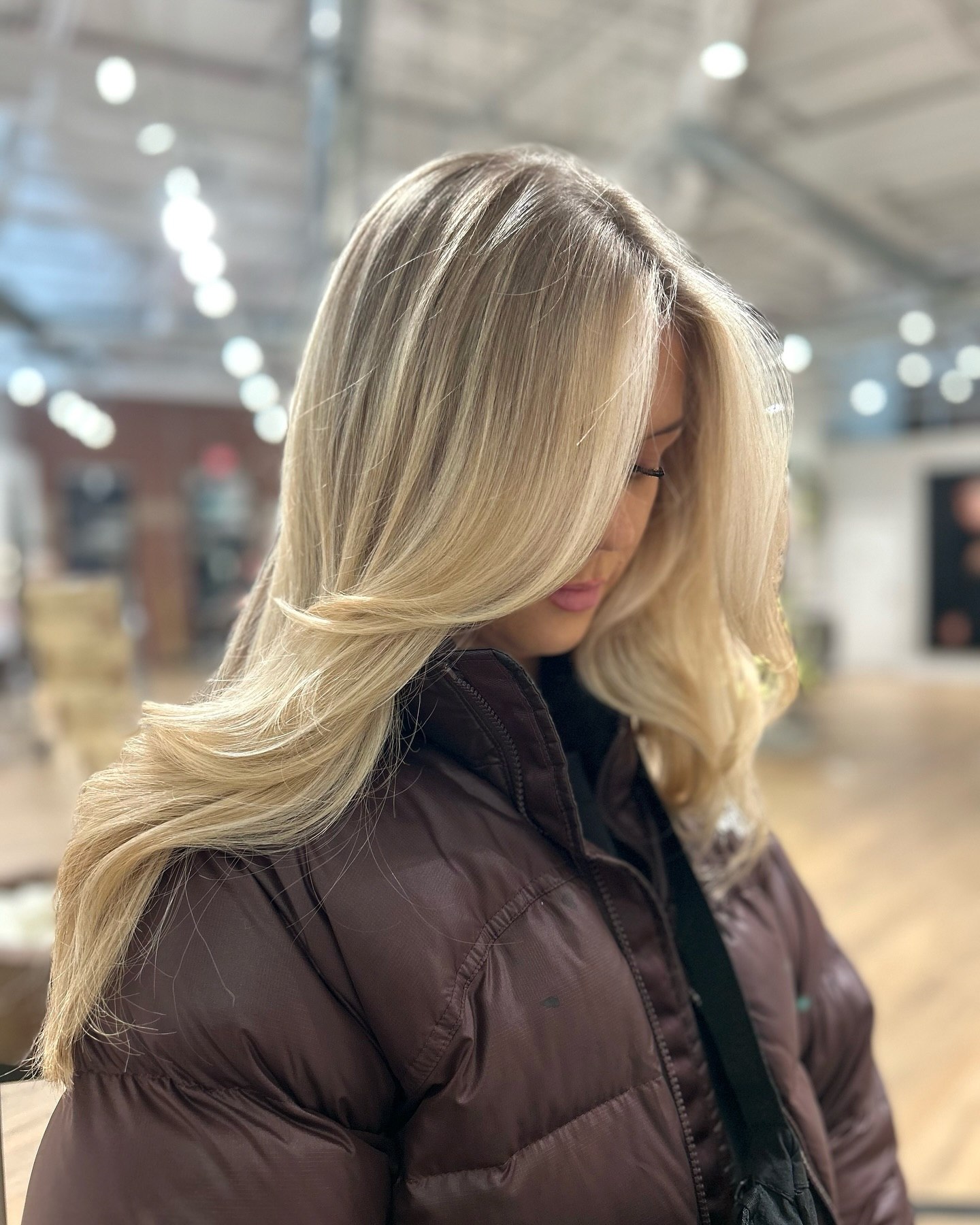 Cascading Honey Blonde Layers With Face Framing