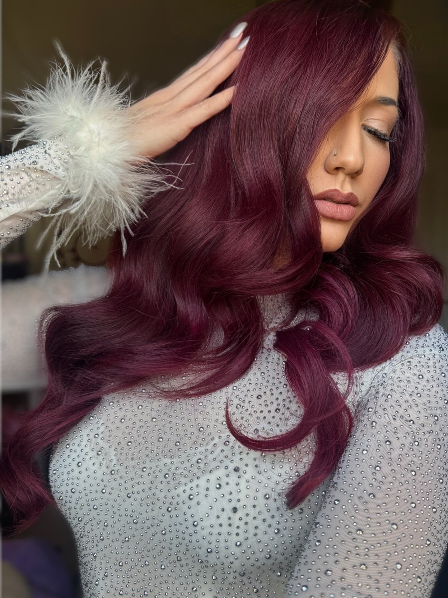 Deep Plum Waves With Subtle Face-Framing Layers